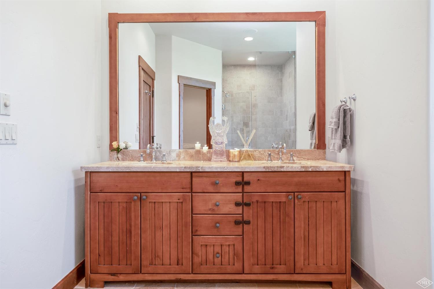 74 Lasso Gypsum, CO 81637 - Photo 12 of 25 a bathroom with a sink and a mirror