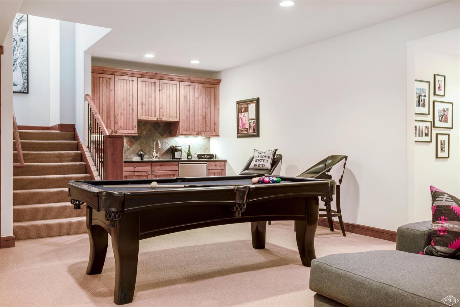 74 Lasso Gypsum, CO 81637 - Photo 13 of 25 a room with a table chairs and a piano