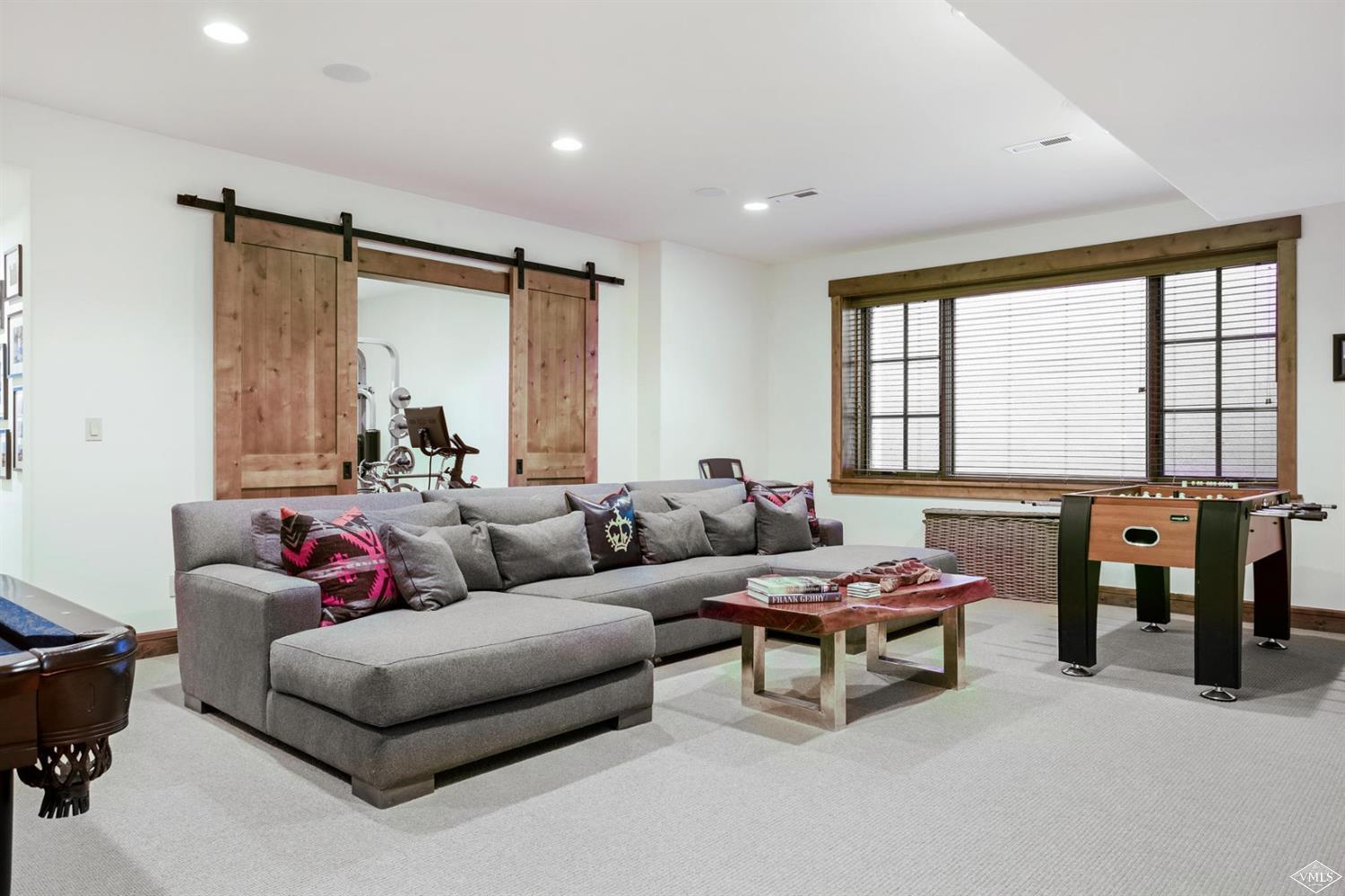74 Lasso Gypsum, CO 81637 - Photo 14 of 25 a living room with furniture and large windows