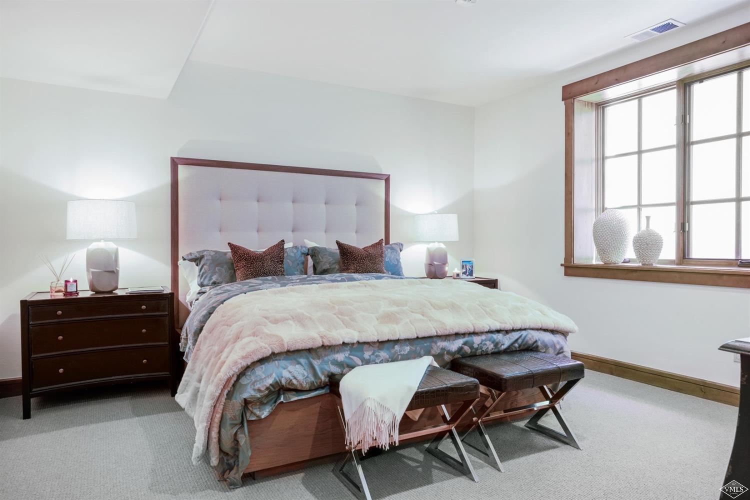 74 Lasso Gypsum, CO 81637 - Photo 16 of 25 a bedroom with a bed chair and window