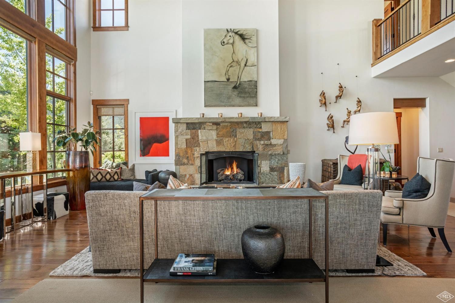 74 Lasso Gypsum, CO 81637 - Photo 3 of 25 a living room with furniture and a fireplace
