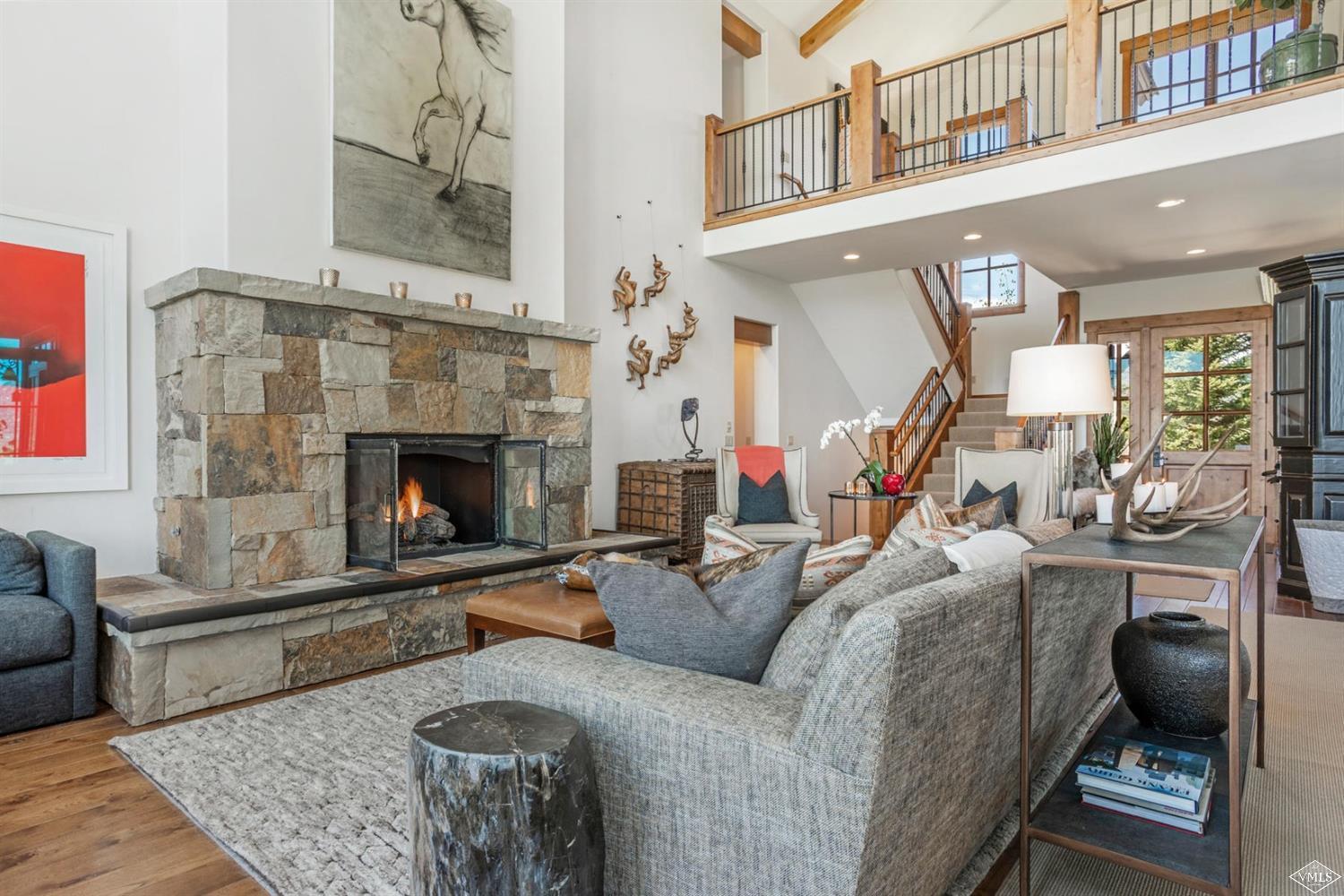 74 Lasso Gypsum, CO 81637 - Photo 4 of 25 a living room with furniture and a fireplace