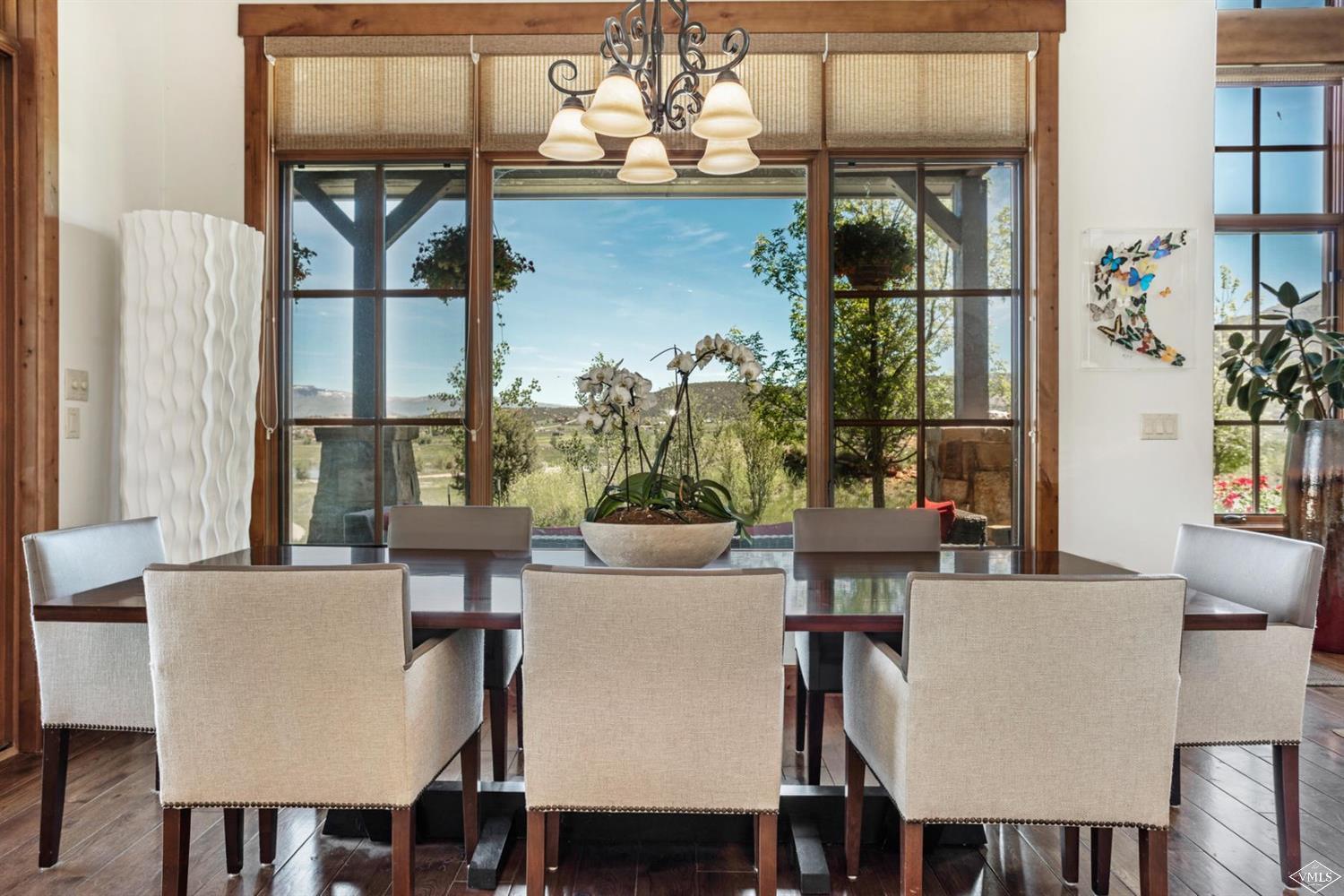 74 Lasso Gypsum, CO 81637 - Photo 5 of 25 a view of a dining room with furniture and wooden floor