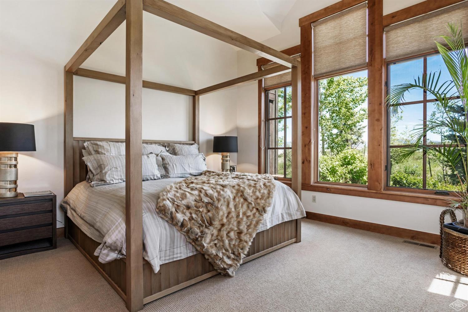 74 Lasso Gypsum, CO 81637 - Photo 10 of 25 a bed sitting in a spacious bedroom next to a window