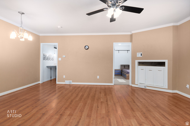 146 West 200 N Street Springville, UT 84663 - Photo 5 of 29 Expansive room featuring wood-finish flooring, light tan walls, and white baseboards