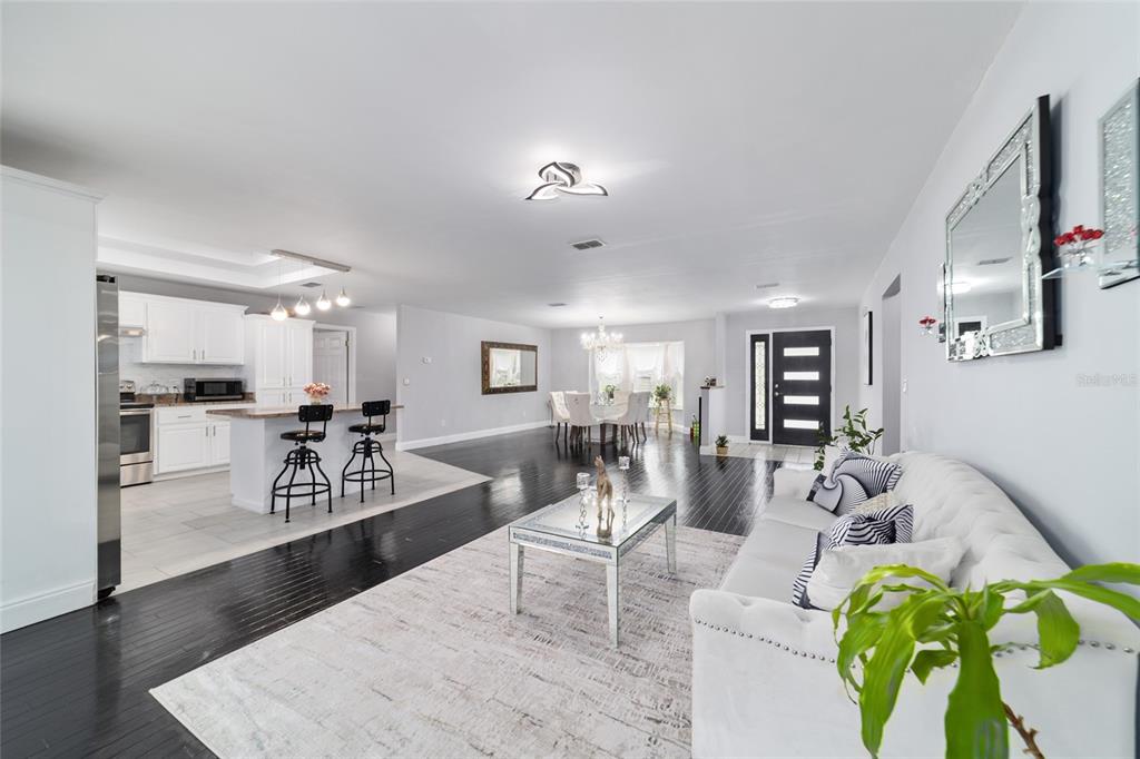 985 Northwest 73rd Terrace Ocala, FL 34482 - Photo 18 of 89 a living room with furniture and a table