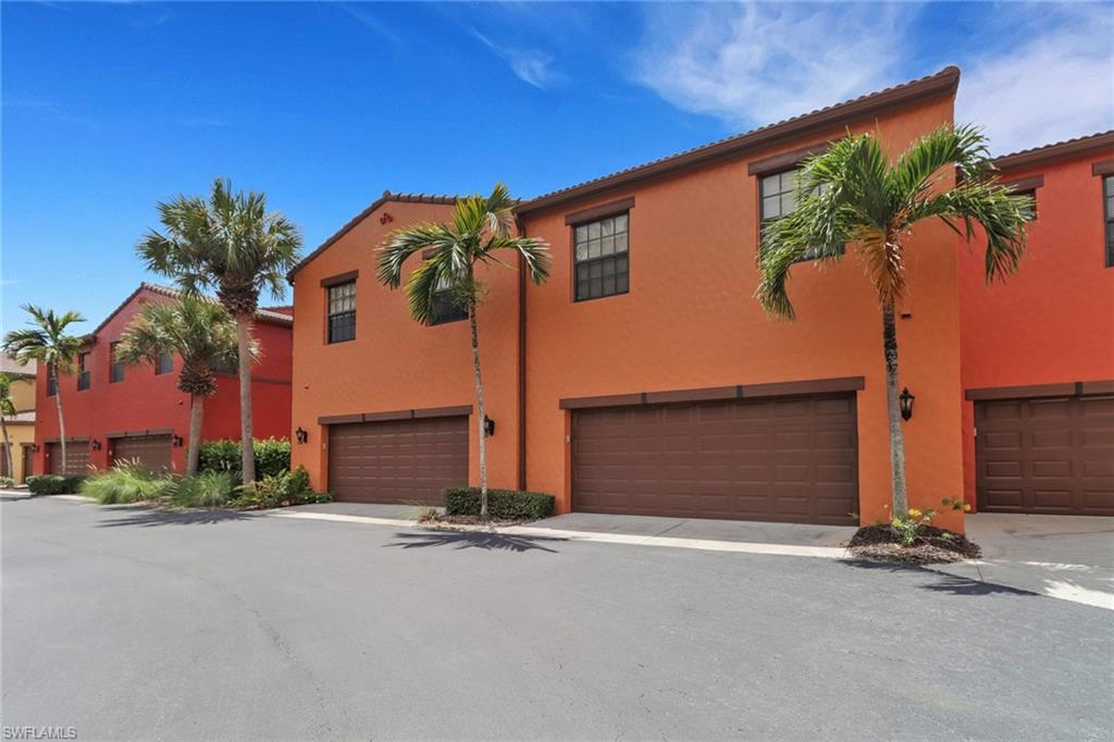 9098 Capistrano Street South, Unit 7102 Naples, FL 34113 - Photo 19 of 23 2-car garage leading to your private quads pool