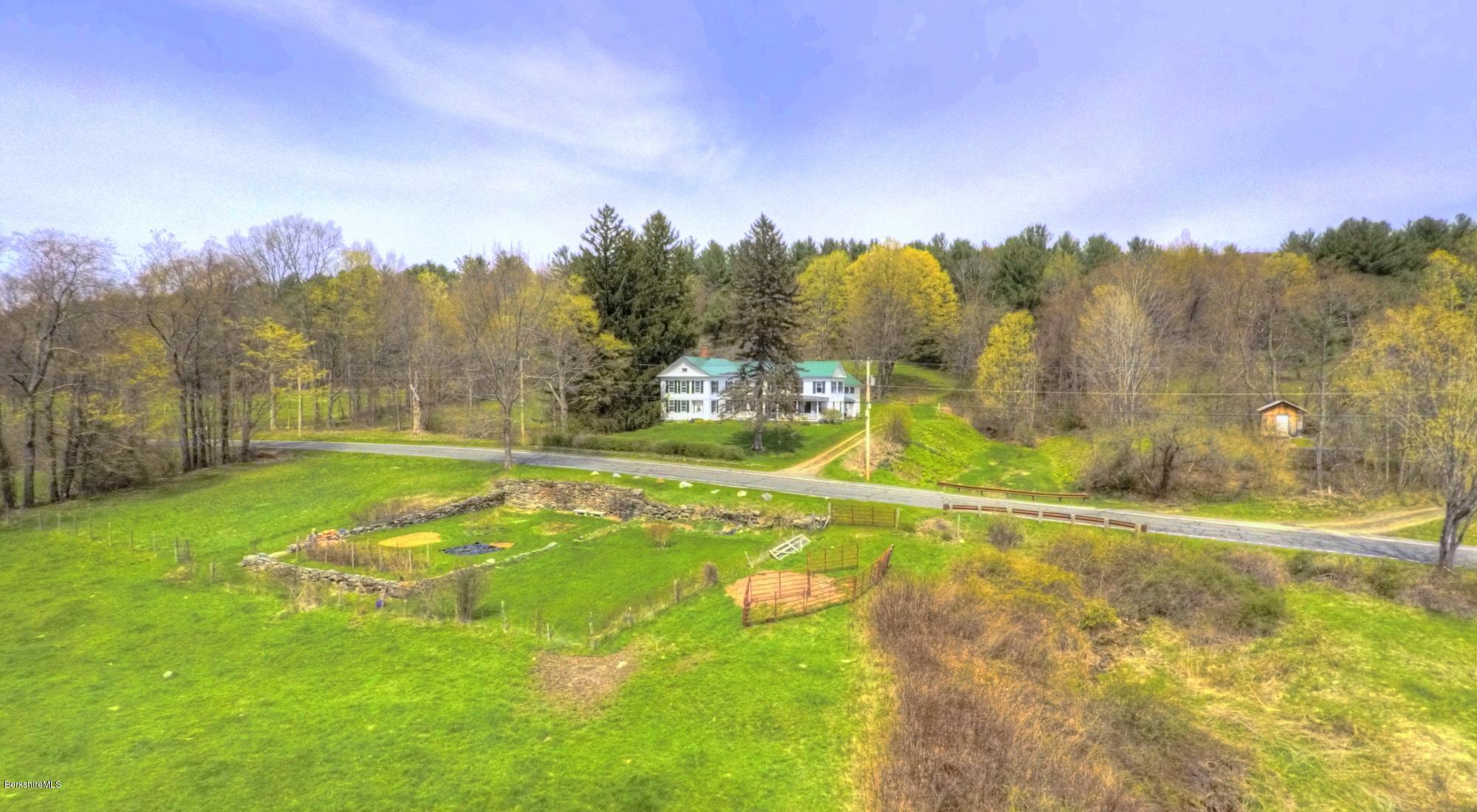 207 Main Road Tyringham, MA 01264 - Photo 11 of 71 a view of a swimming pool