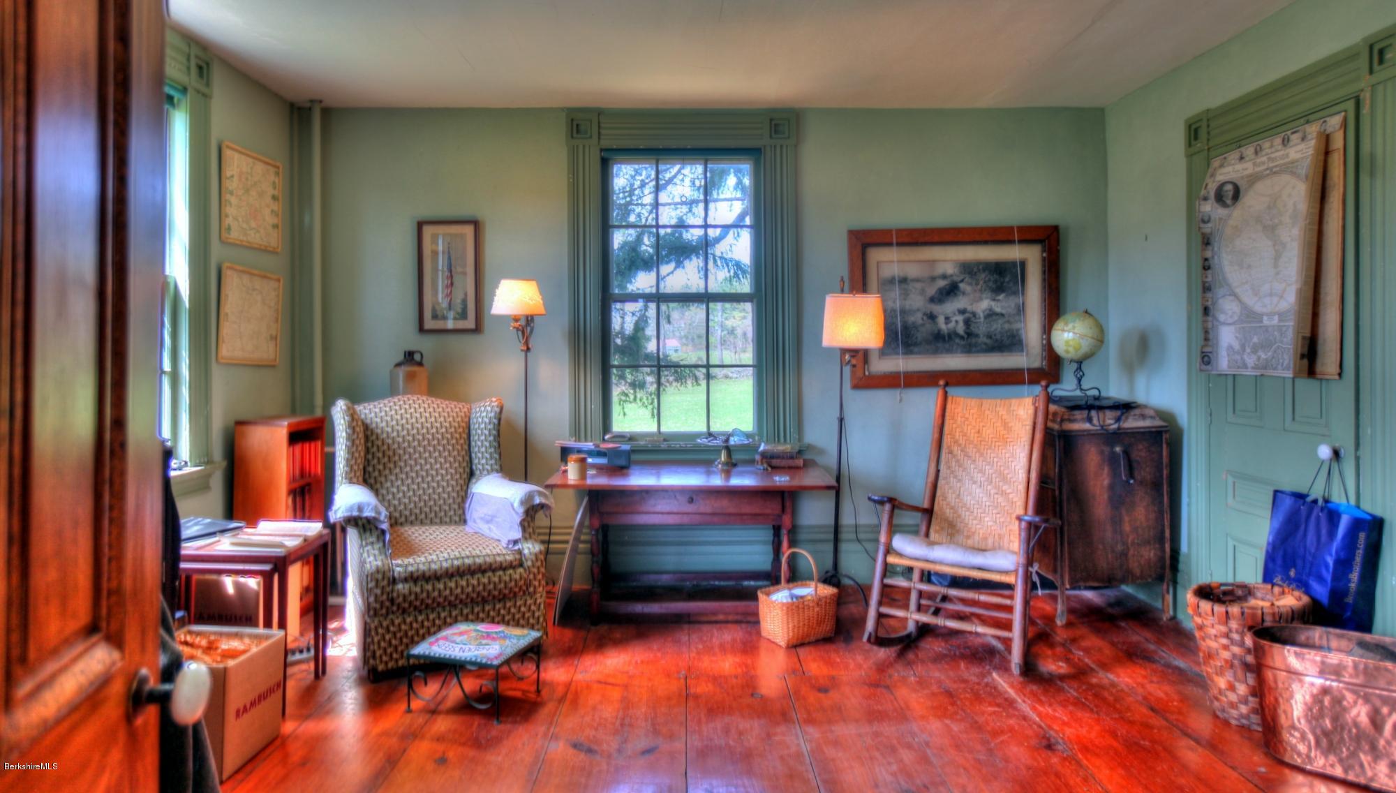 207 Main Road Tyringham, MA 01264 - Photo 21 of 71 a living room with furniture and a window