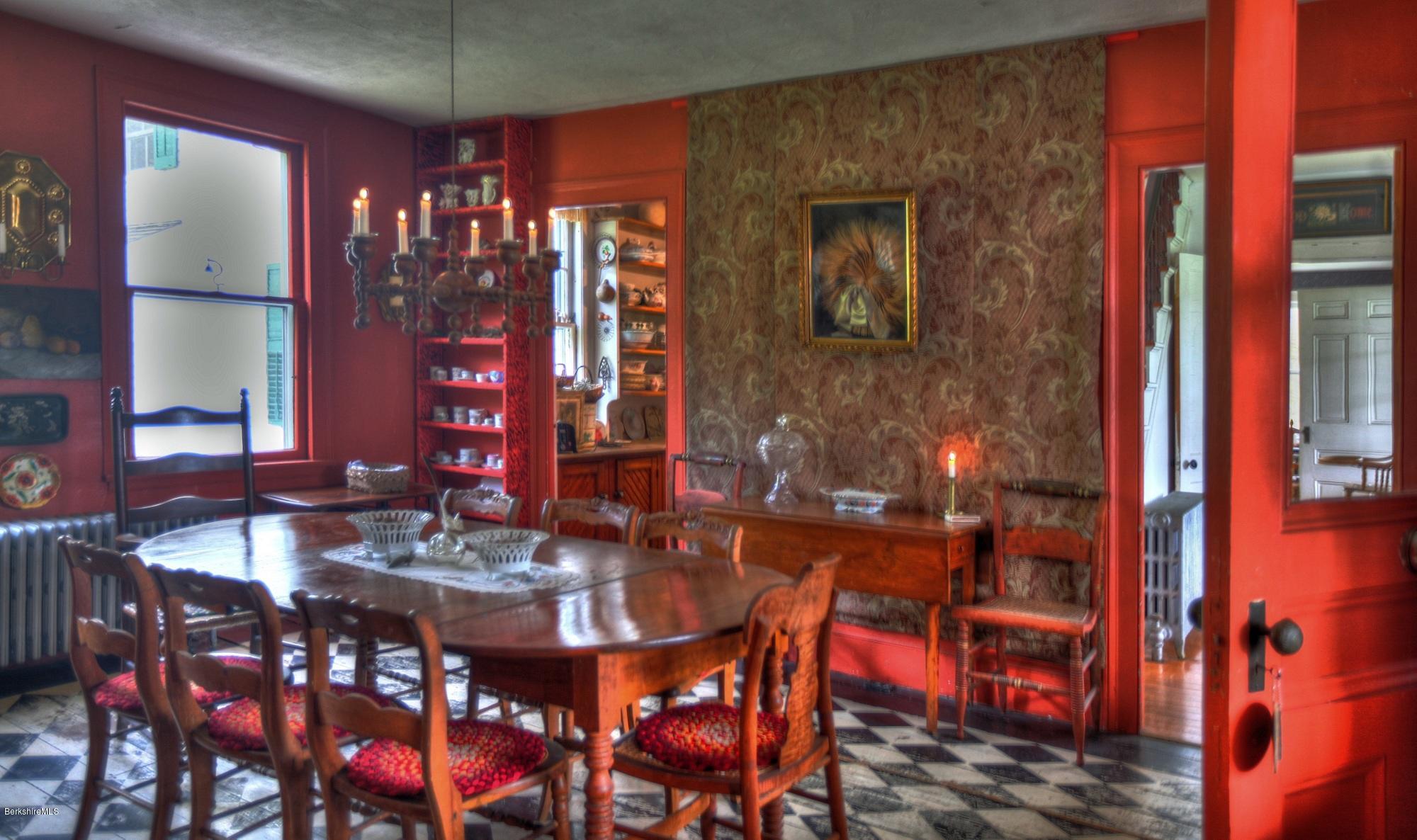 207 Main Road Tyringham, MA 01264 - Photo 24 of 71 a view of a dining room with furniture and chandelier