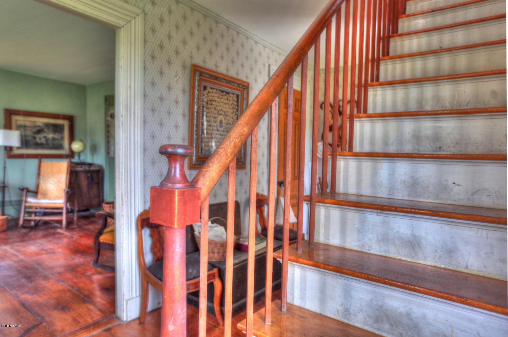 207 Main Road Tyringham, MA 01264 - Photo 36 of 71 a view of staircase with railing and white walls
