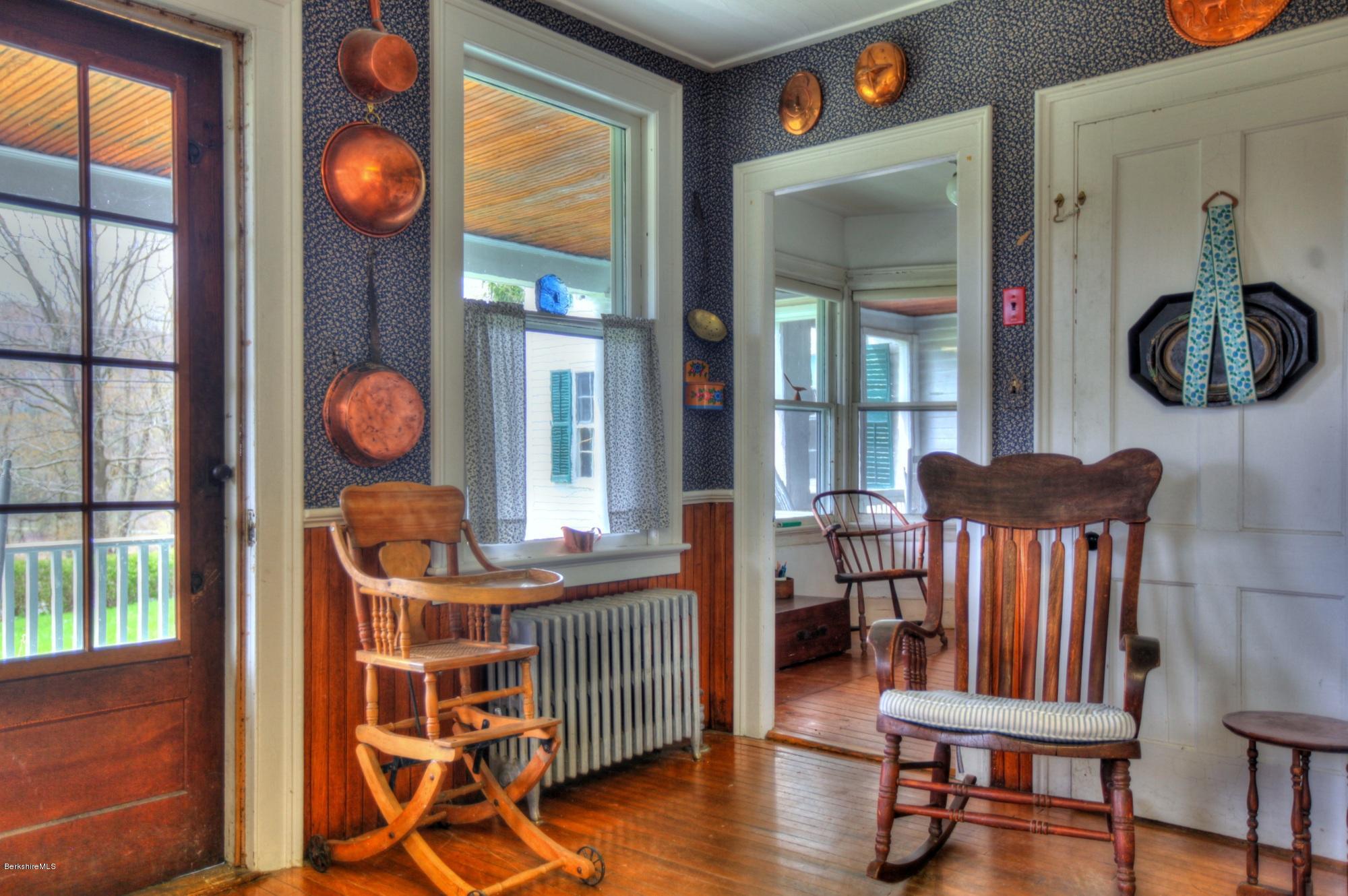 207 Main Road Tyringham, MA 01264 - Photo 50 of 71 a room with furniture and wooden floor