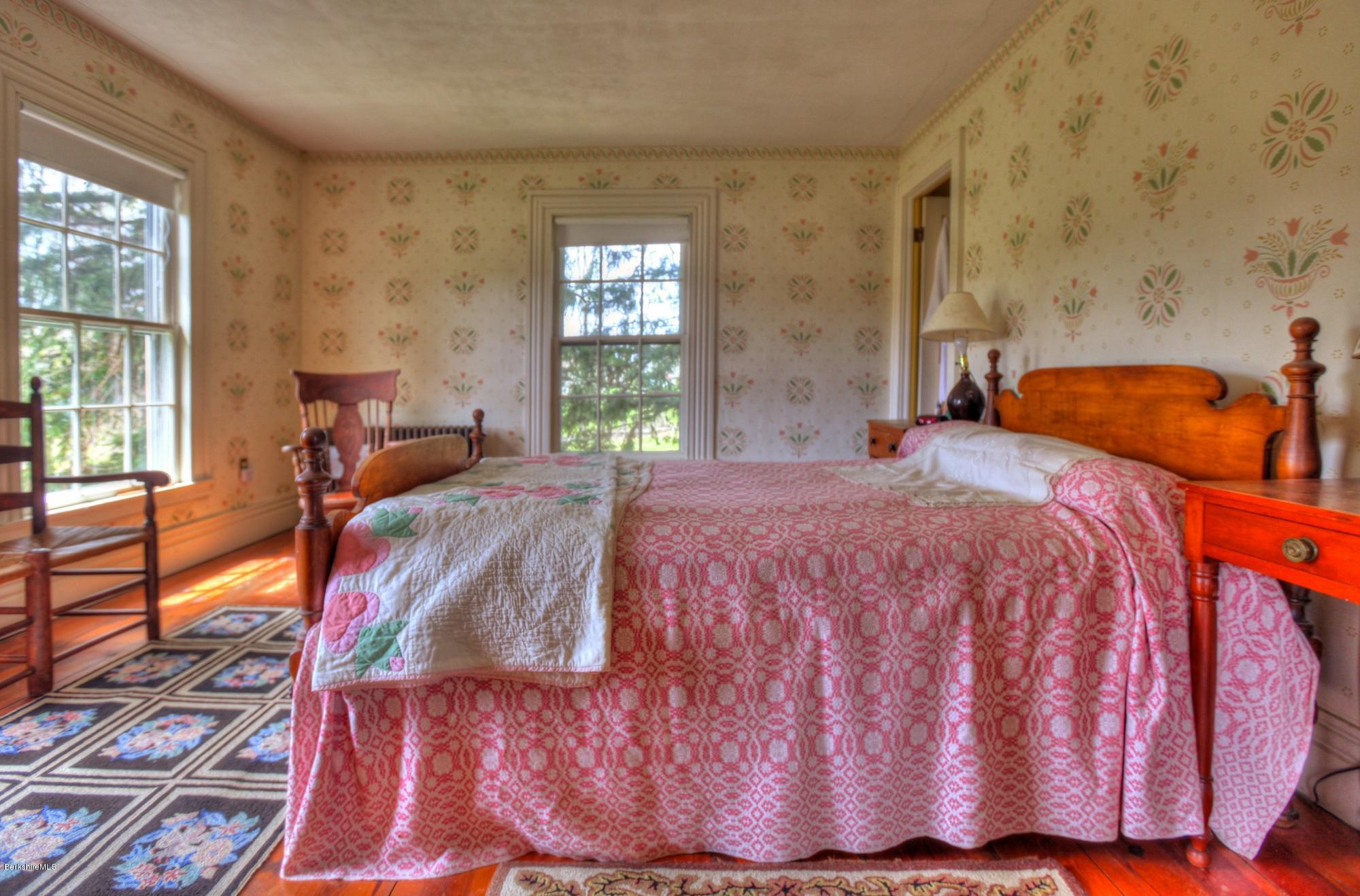 207 Main Road Tyringham, MA 01264 - Photo 53 of 71 a bedroom with a bed and window