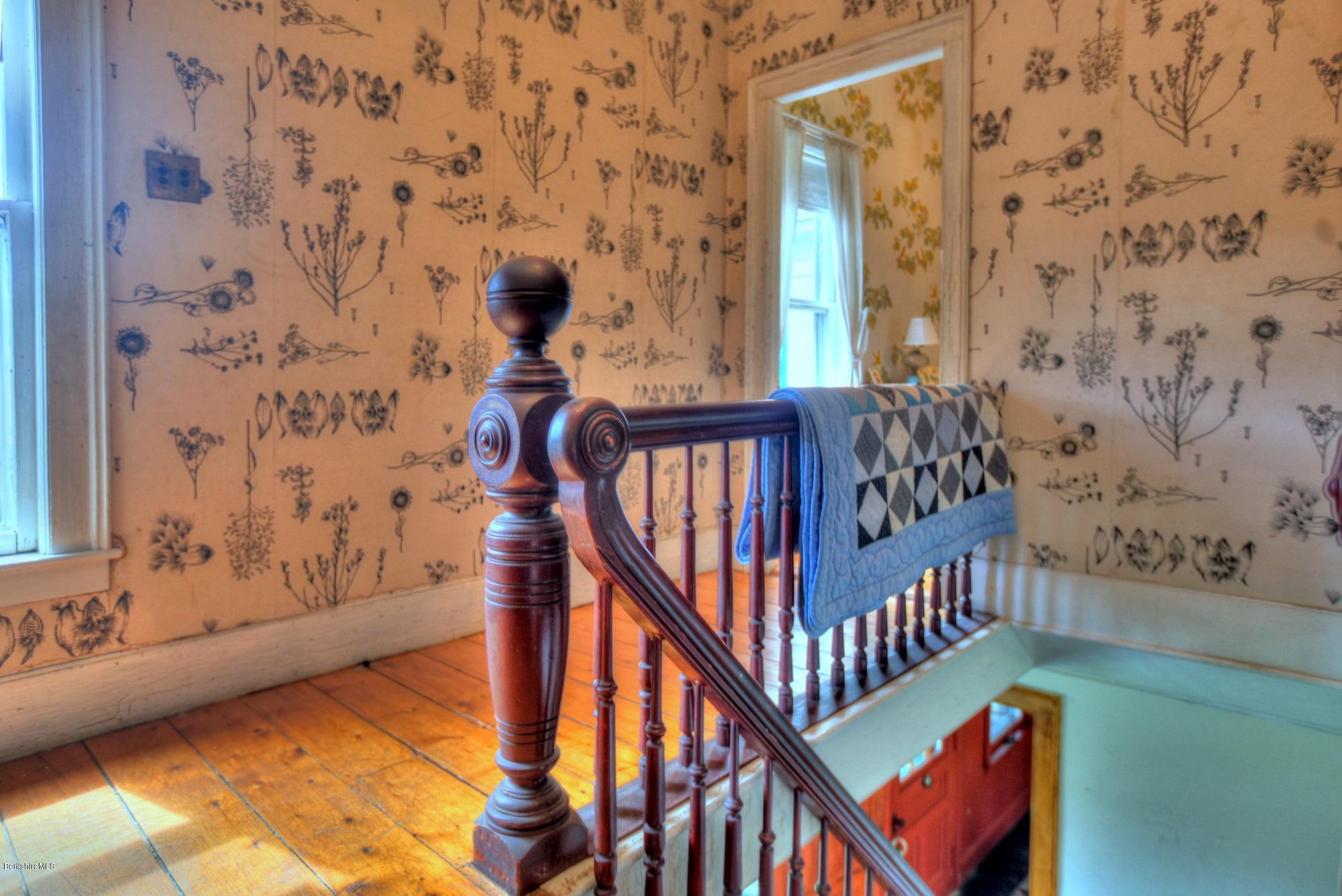 207 Main Road Tyringham, MA 01264 - Photo 59 of 71 a view of a balcony with wooden floor