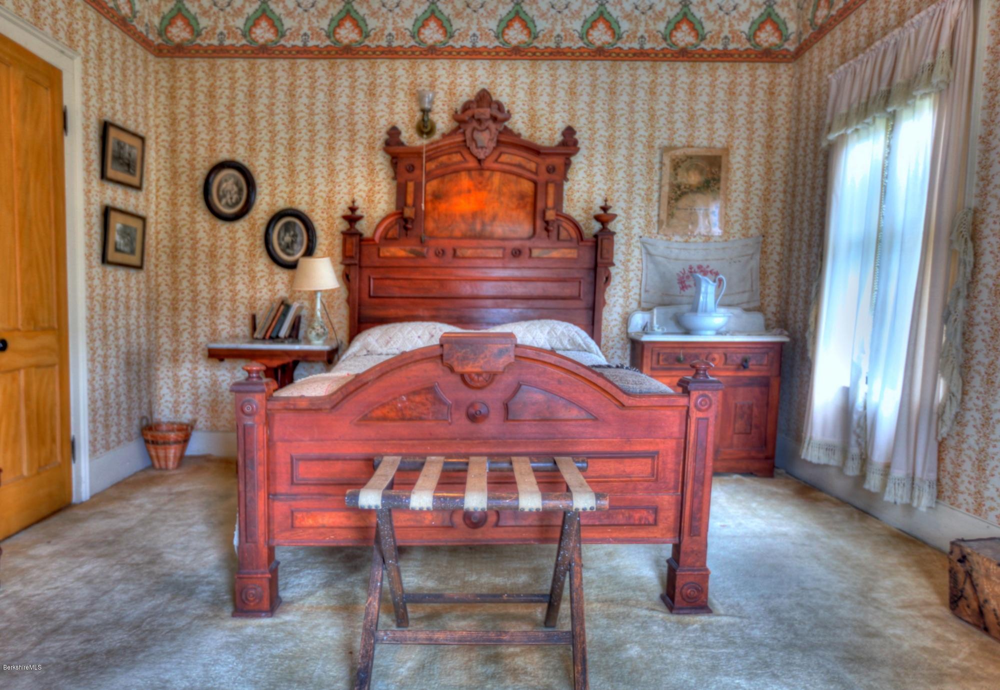 207 Main Road Tyringham, MA 01264 - Photo 60 of 71 a view of a chairs in a room