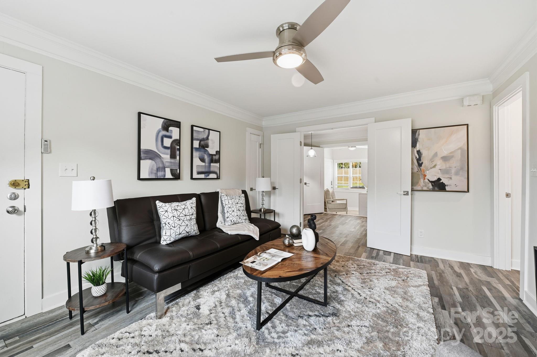 912 McAlway Road, Unit A Charlotte, NC 28211 - Photo 1 of 33 a living room with furniture a rug and a window