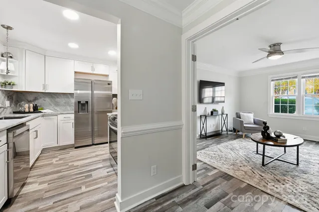 a living room with furniture and a table