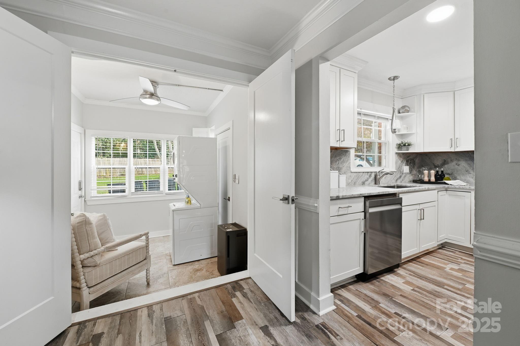 912 McAlway Road, Unit A Charlotte, NC 28211 - Photo 18 of 33 a kitchen with white cabinets and white appliances