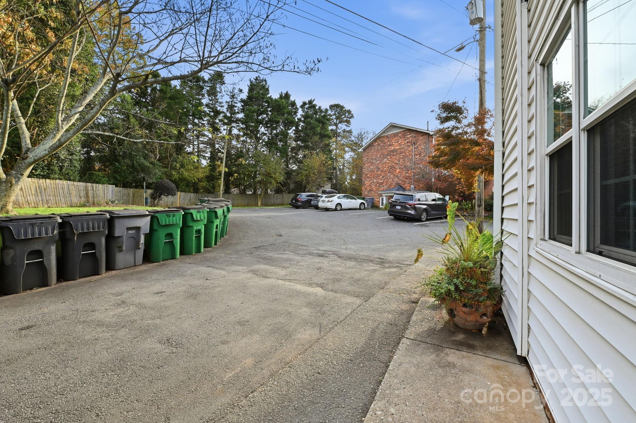 912 McAlway Road, Unit A Charlotte, NC 28211 - Photo 29 of 33 a view of a house with a patio