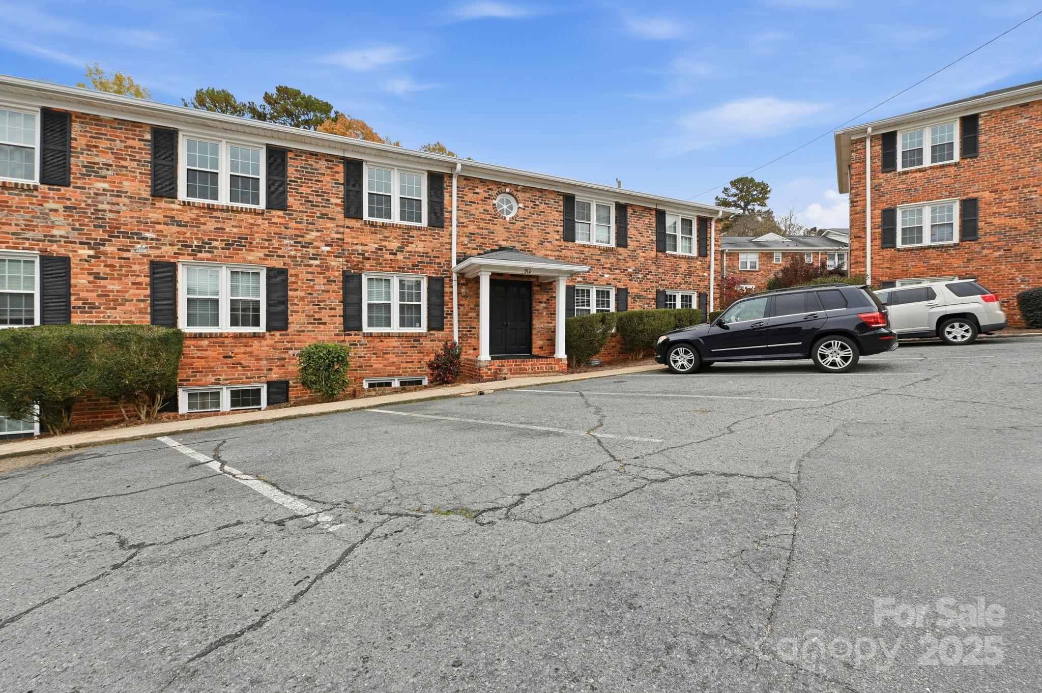 912 McAlway Road, Unit A Charlotte, NC 28211 - Photo 30 of 33 a car parked in front of a building