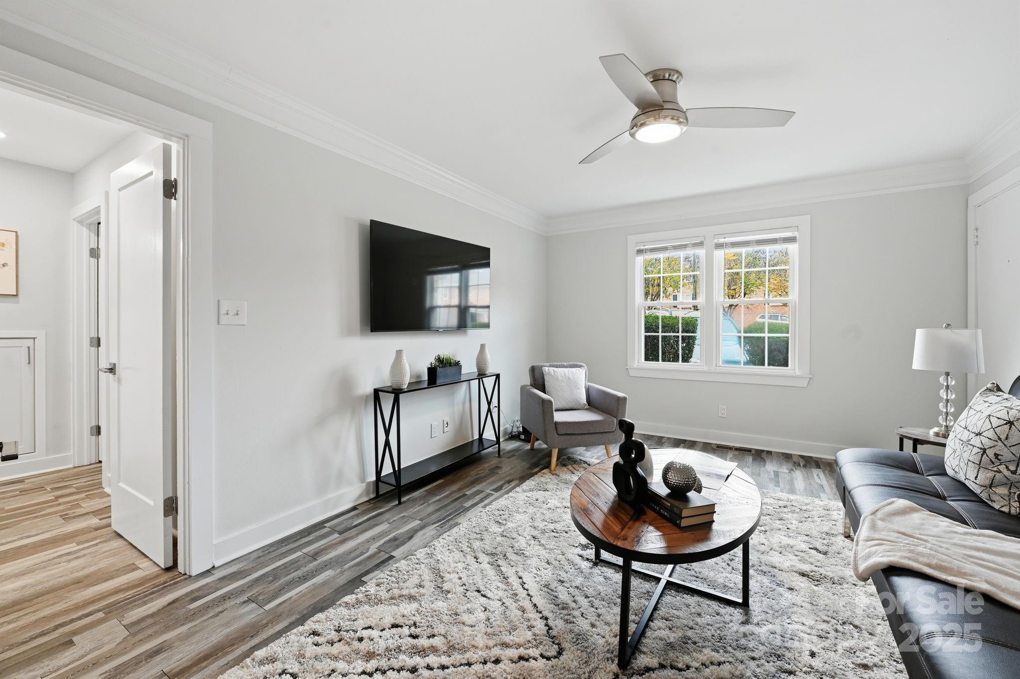 912 McAlway Road, Unit A Charlotte, NC 28211 - Photo 5 of 33 a living room with furniture and a flat screen tv
