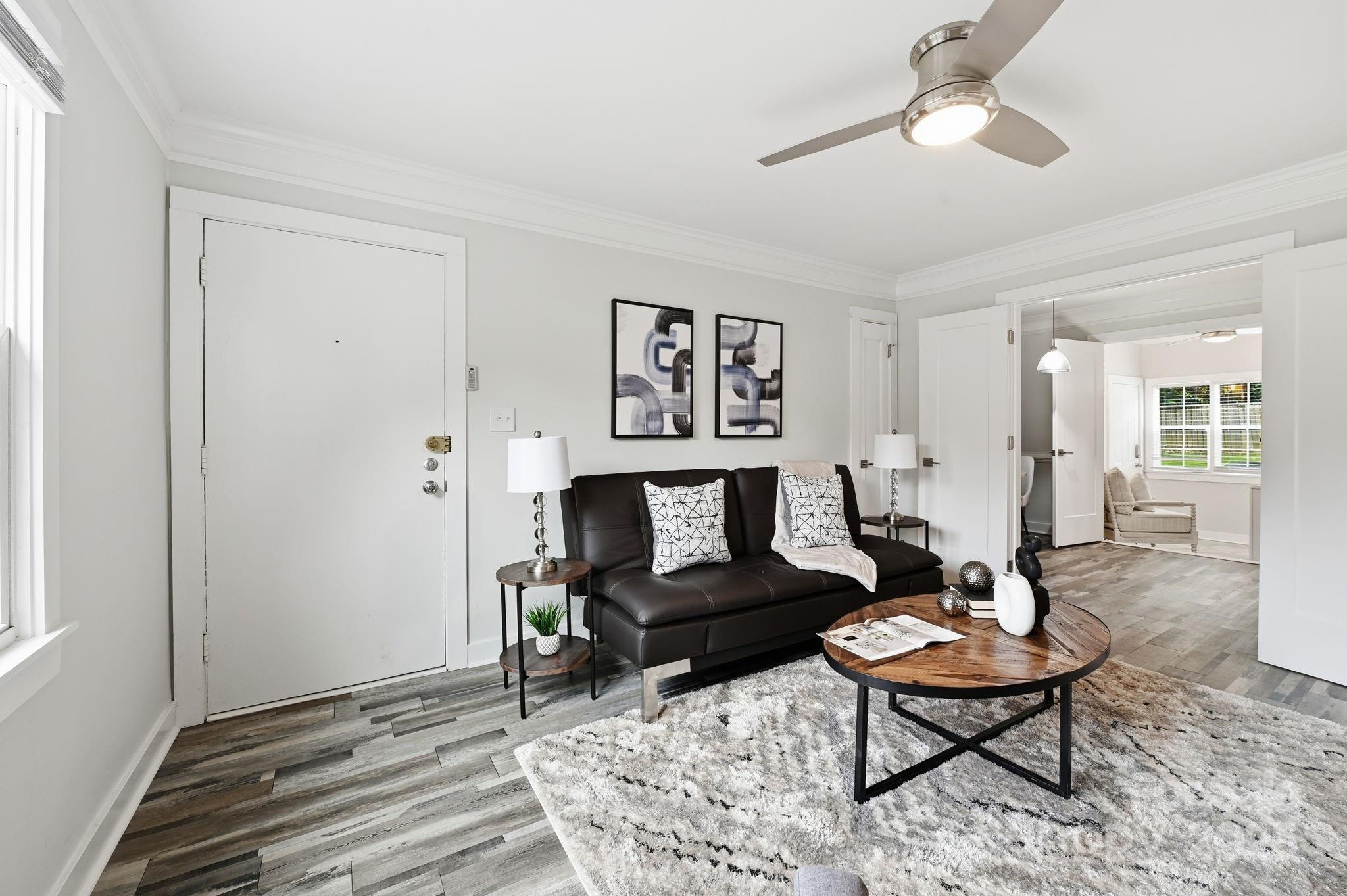 912 McAlway Road, Unit A Charlotte, NC 28211 - Photo 6 of 33 a living room with furniture and a wooden floor