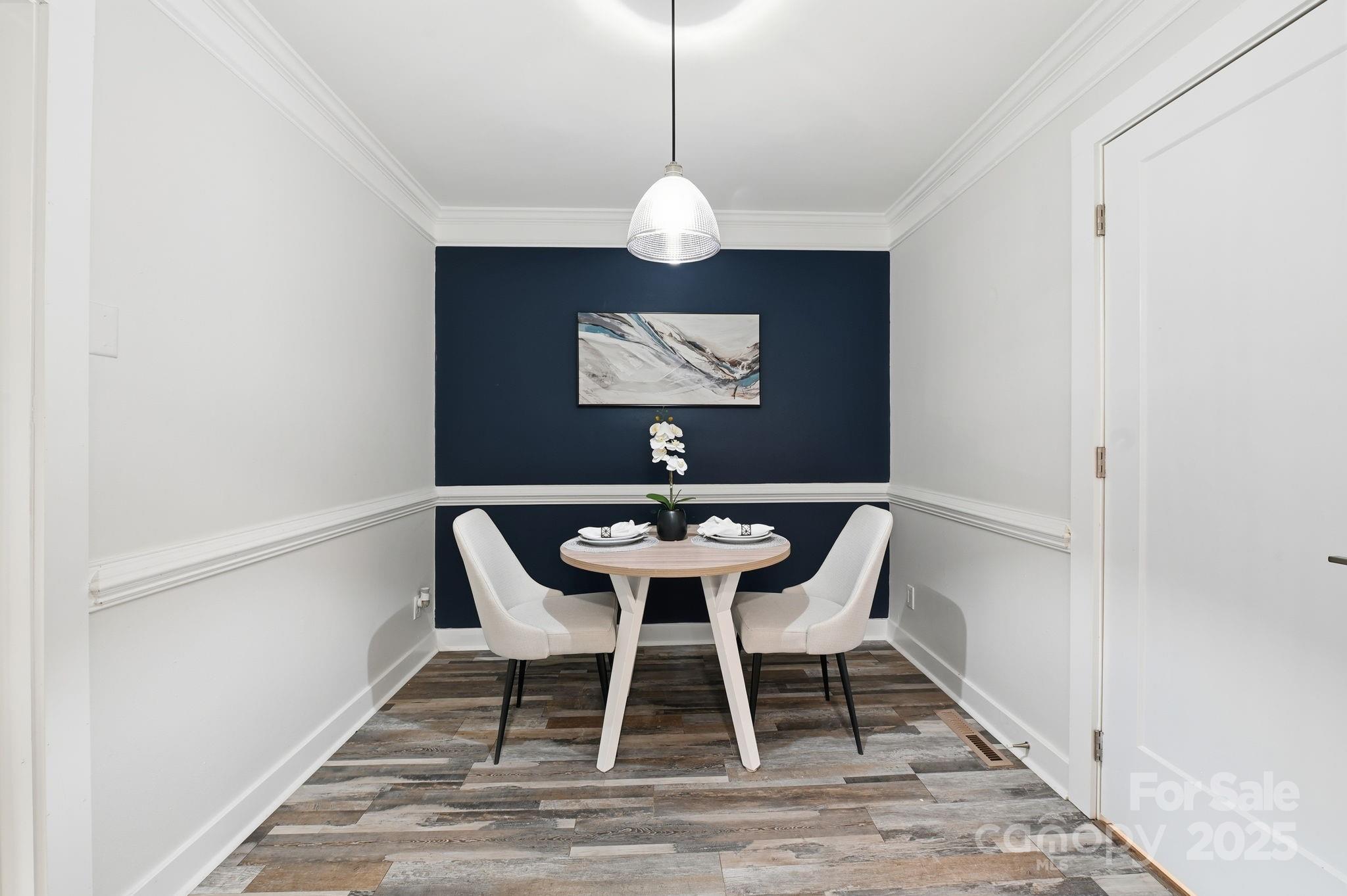 912 McAlway Road, Unit A Charlotte, NC 28211 - Photo 10 of 33 a view of a dining room with a table and chairs