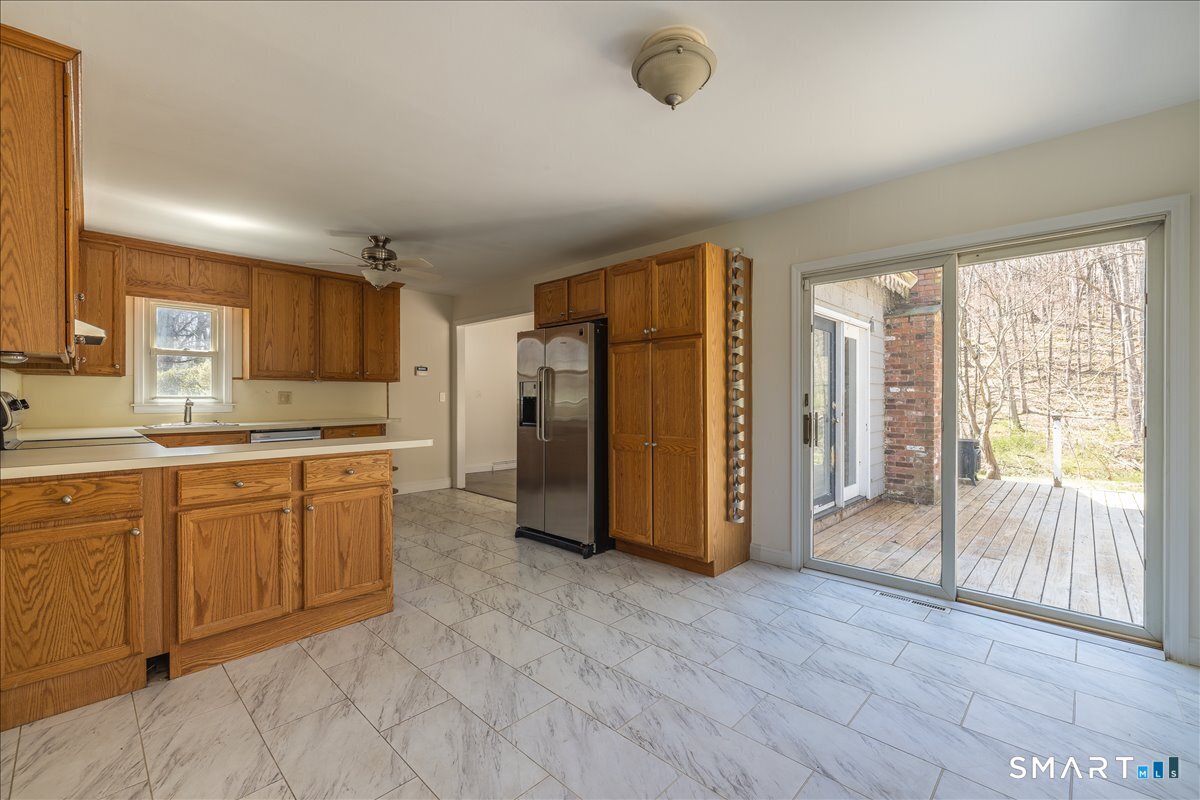 370 Quaker Farms Road Southbury, CT 06488 - Photo 11 of 35 a large kitchen with a window and refrigerator