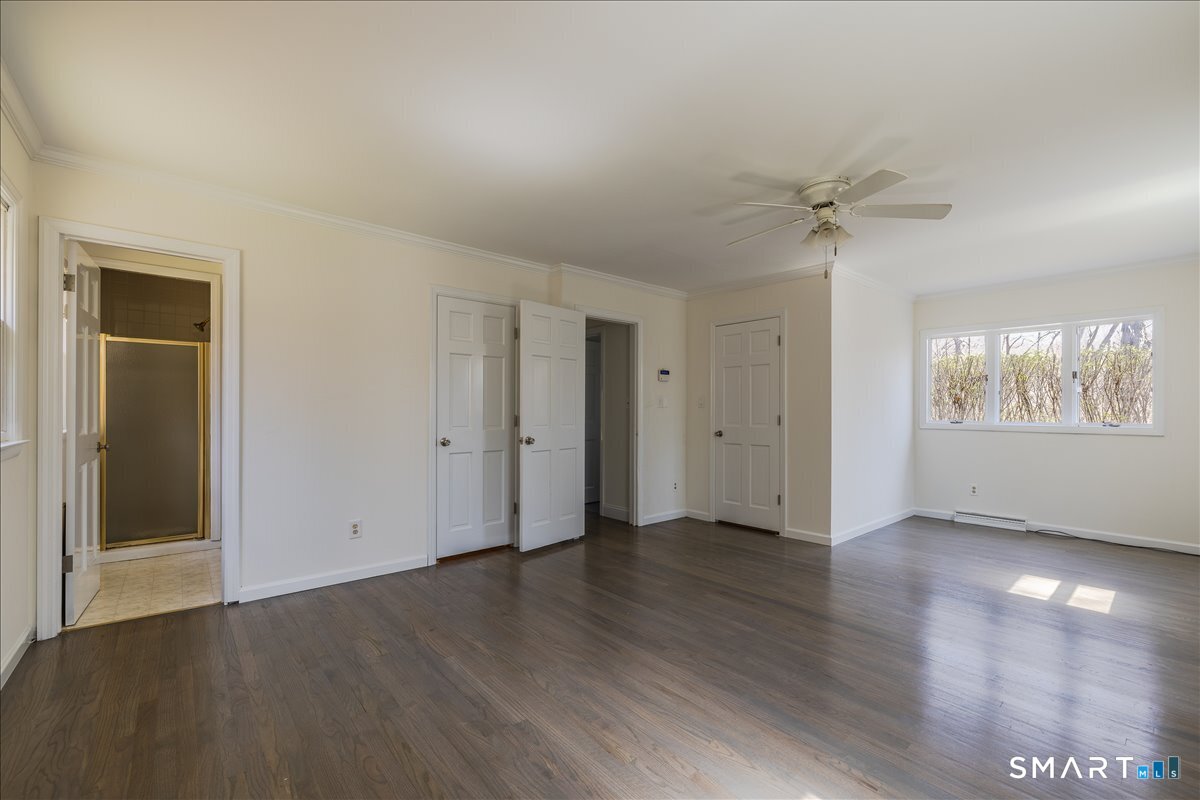 370 Quaker Farms Road Southbury, CT 06488 - Photo 17 of 35 a view of an empty room with a window