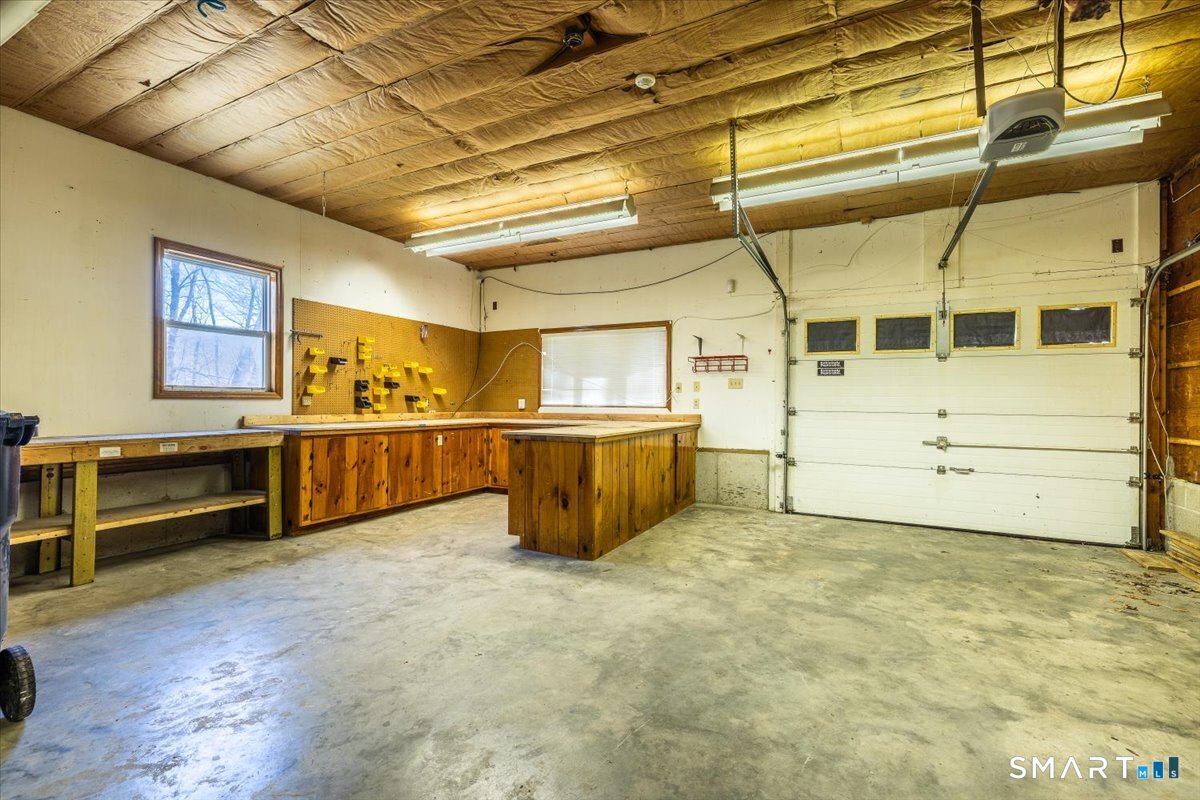 370 Quaker Farms Road Southbury, CT 06488 - Photo 23 of 35 a view of a room with storage and utility room