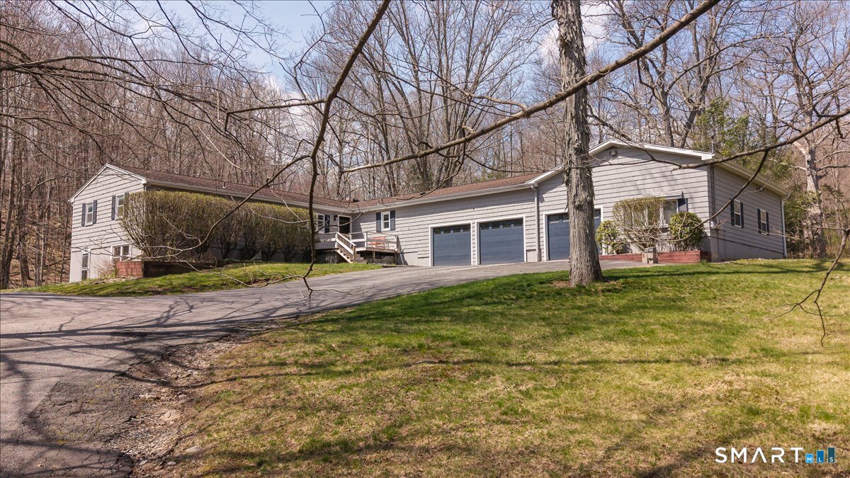 370 Quaker Farms Road Southbury, CT 06488 - Photo 35 of 35 a view of a house with a yard