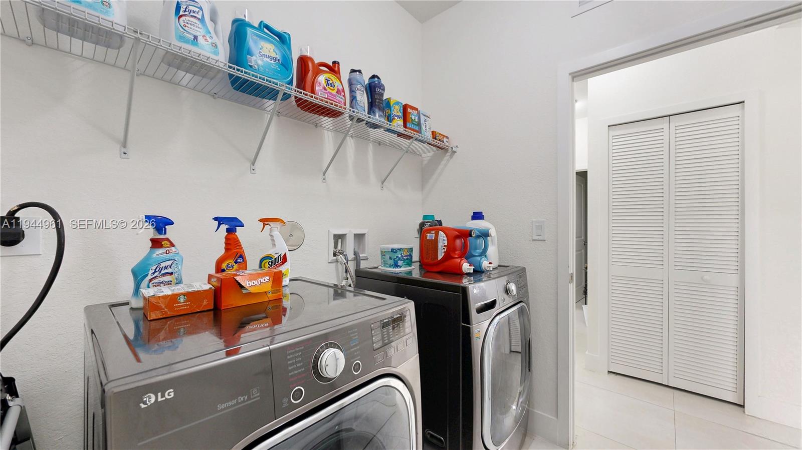 31171 Southwest 193rd Avenue Homestead, FL 33030 - Photo 28 of 36 a utility room with dryer and washer
