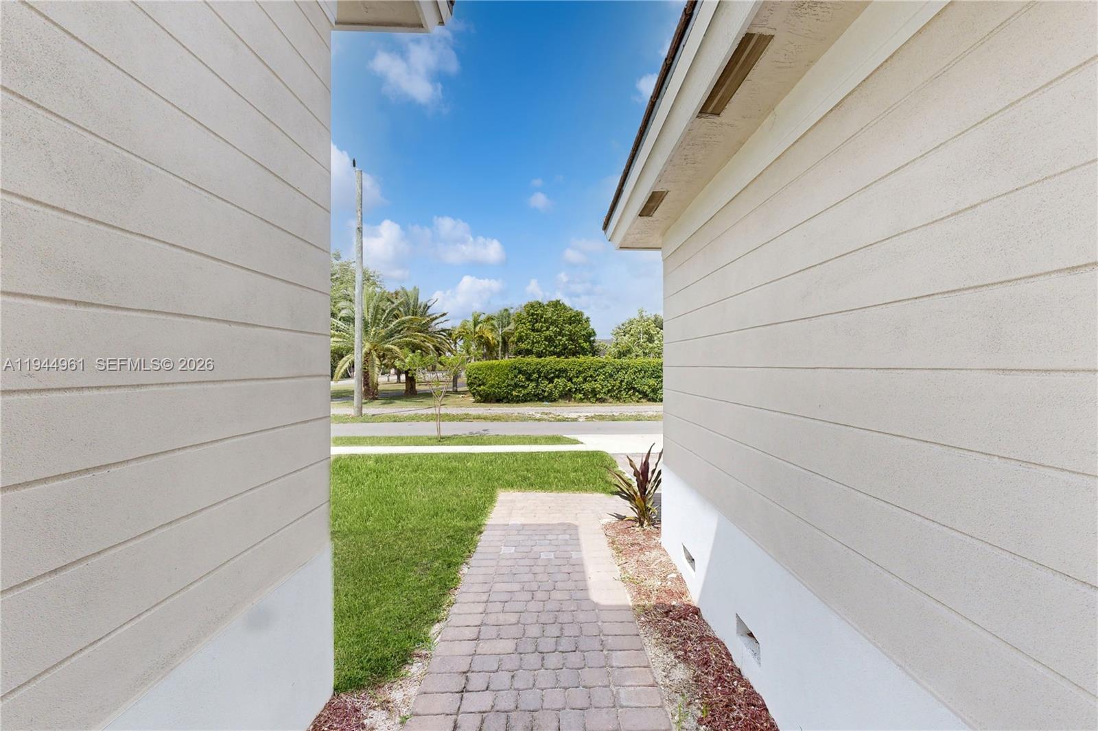 31171 Southwest 193rd Avenue Homestead, FL 33030 - Photo 29 of 36 a view of back yard of the house