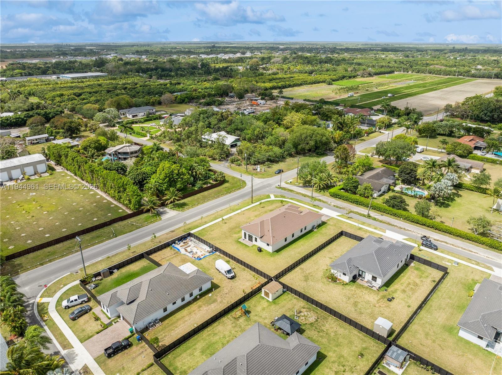 31171 Southwest 193rd Avenue Homestead, FL 33030 - Photo 34 of 36 an aerial view of a pool and chairs