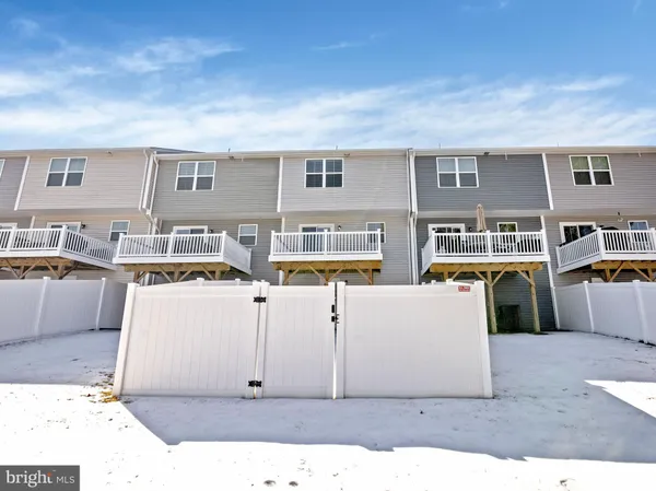 a front view of a building with street view