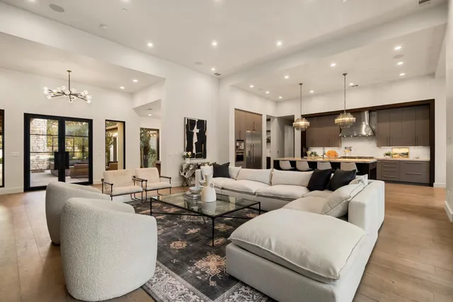 a living room with fireplace furniture and a flat screen tv