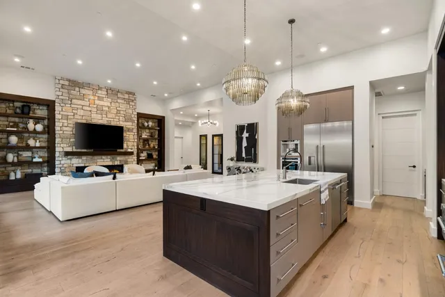 a view of a patio with couches and potted plants