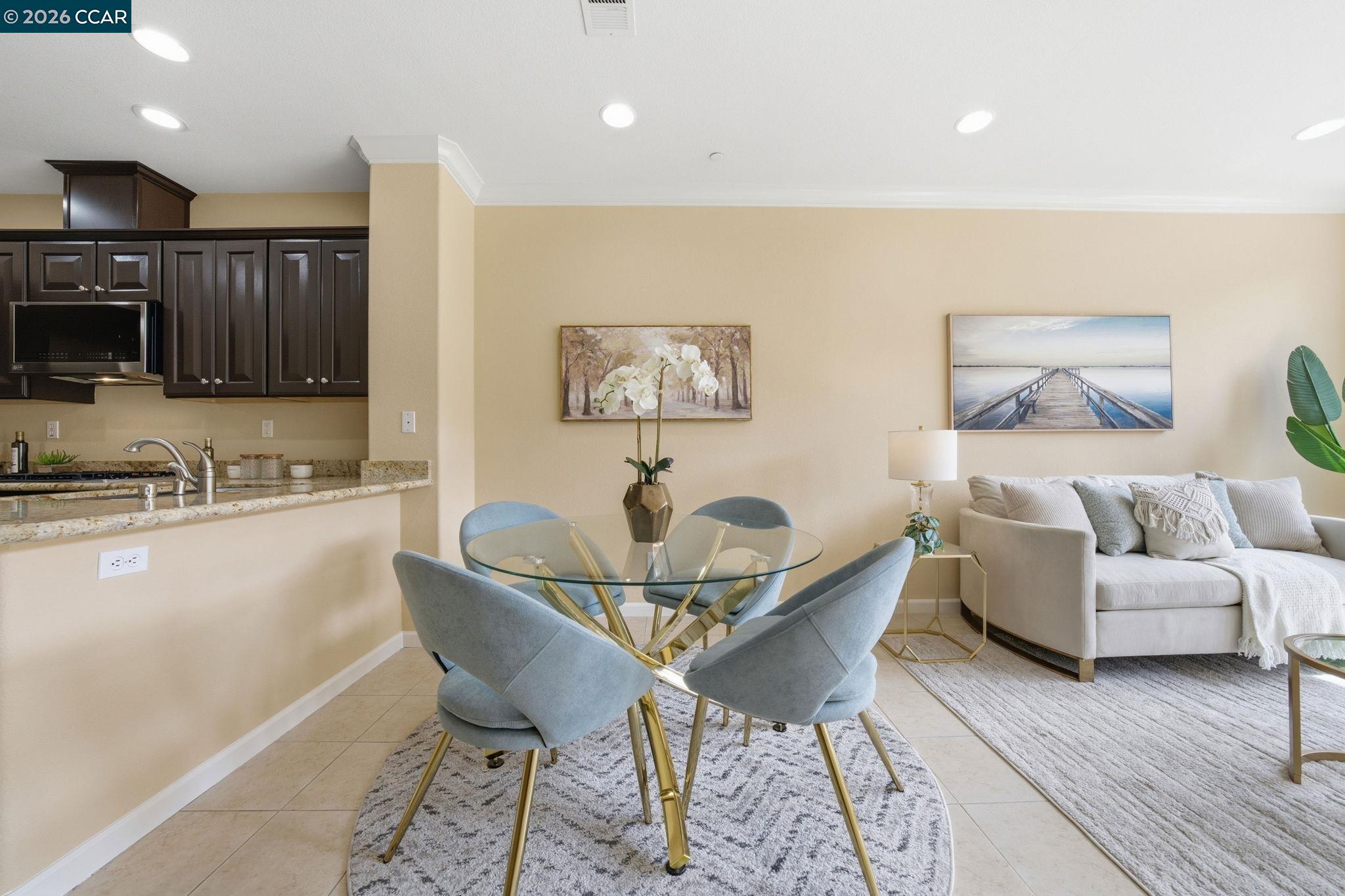 252 Sullivan Way Hayward, CA 94541 - Photo 13 of 55 a dining room with furniture and a kitchen view