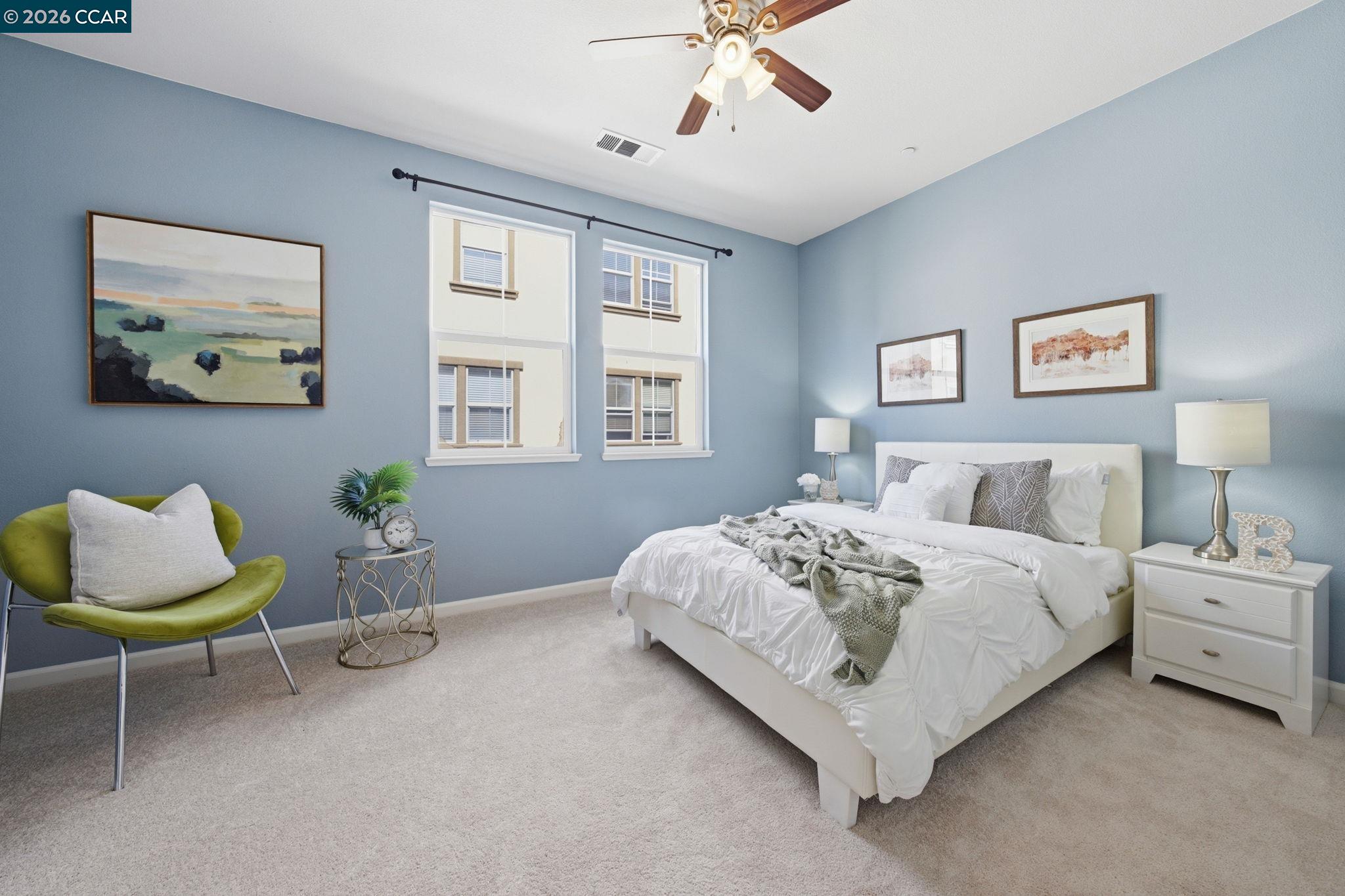 252 Sullivan Way Hayward, CA 94541 - Photo 27 of 55 a bed room with a bed and a chair