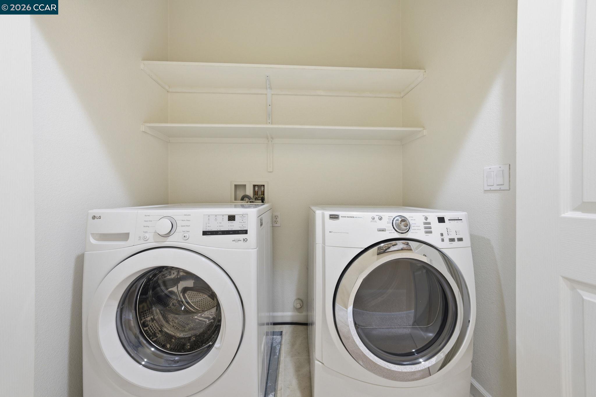 252 Sullivan Way Hayward, CA 94541 - Photo 43 of 55 a utility room with dryer and washer