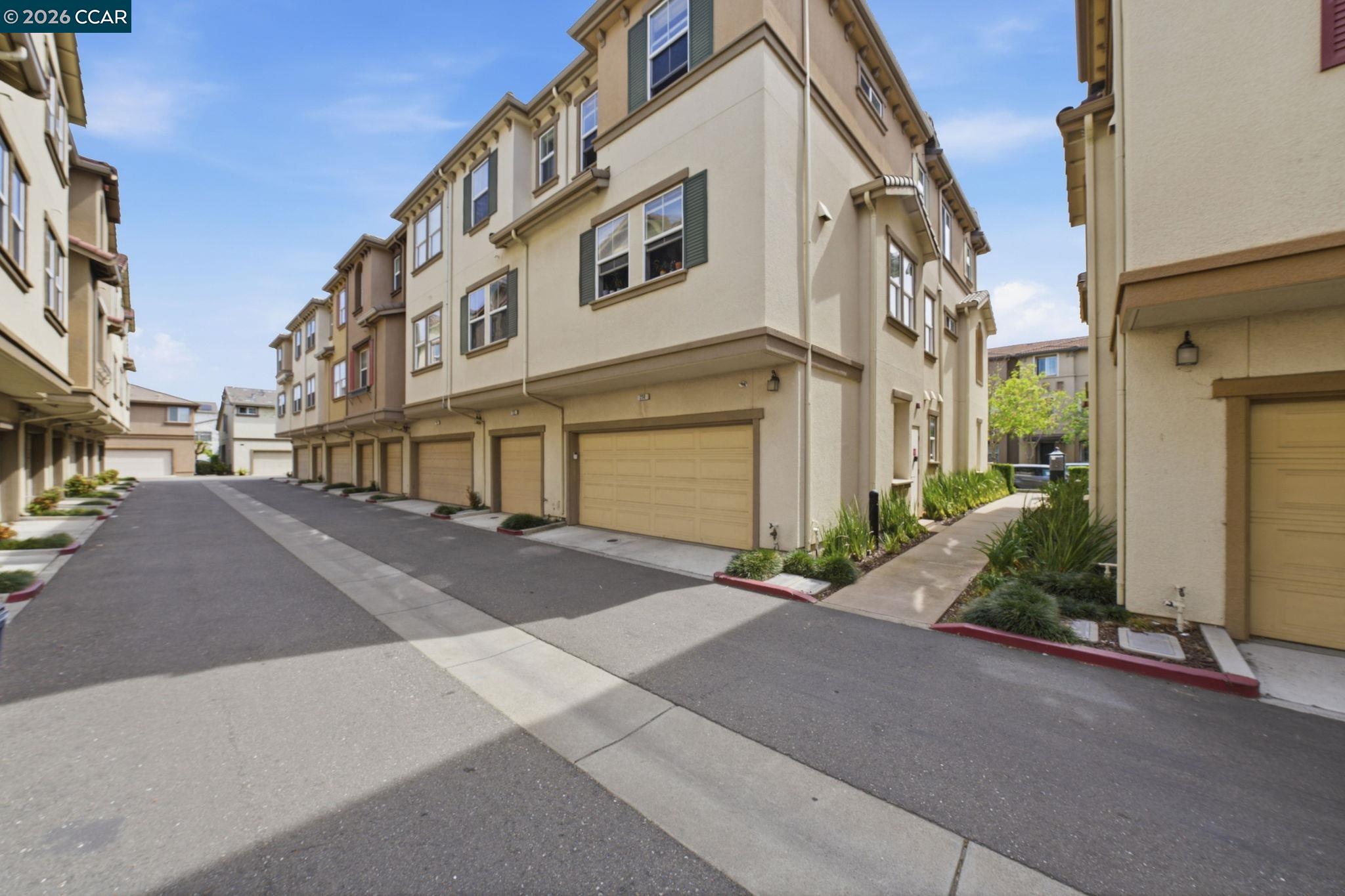 252 Sullivan Way Hayward, CA 94541 - Photo 50 of 55 a city street lined with tall buildings