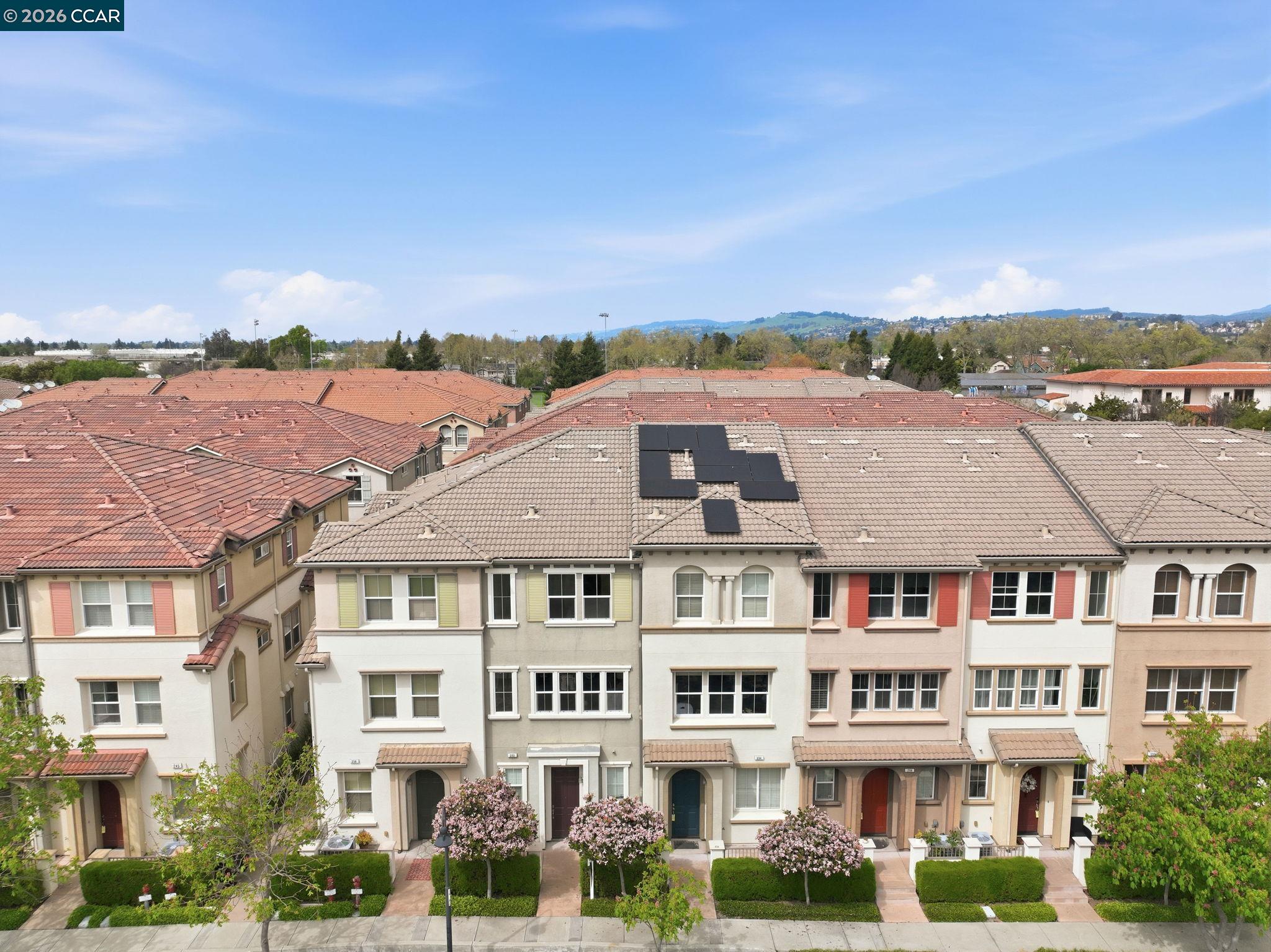 252 Sullivan Way Hayward, CA 94541 - Photo 52 of 55 a front view of a residential apartment building with a yard