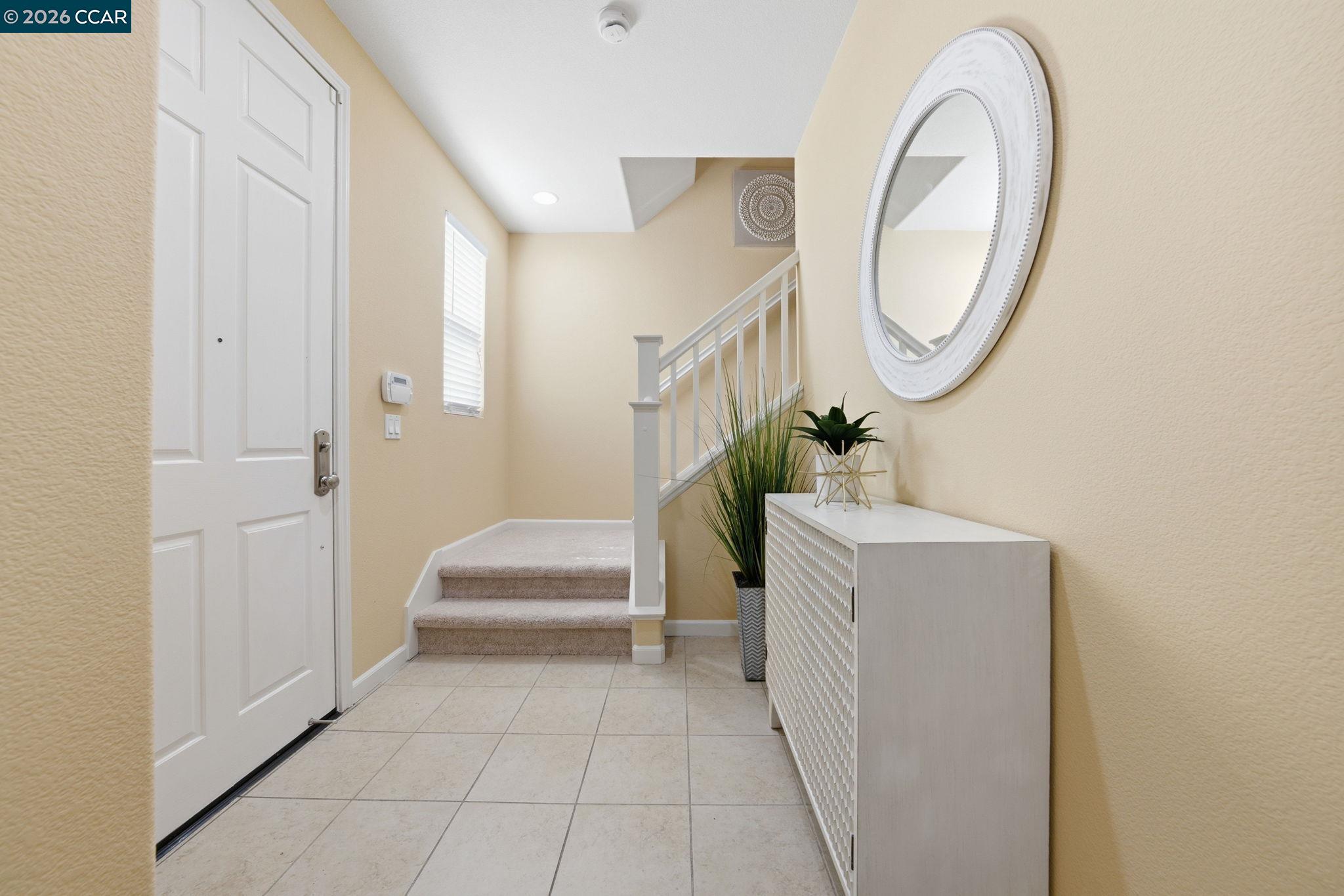 252 Sullivan Way Hayward, CA 94541 - Photo 7 of 55 a hallway with a washer and dryer
