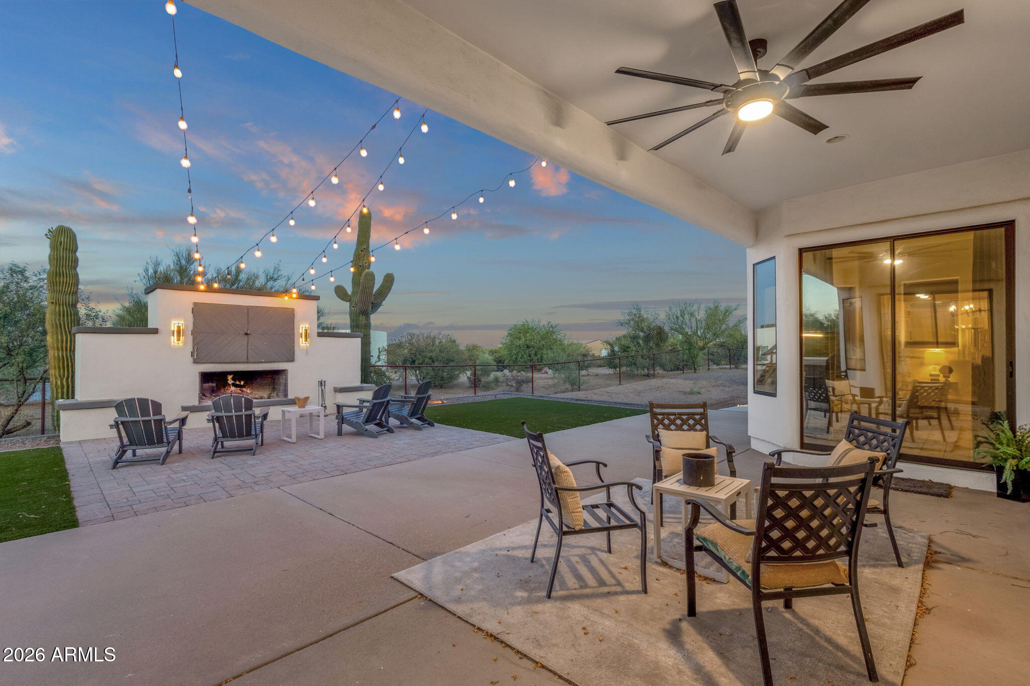 14604 East Peak View Road Scottsdale, AZ 85262 - Photo 29 of 55 a view of a patio with table and chairs