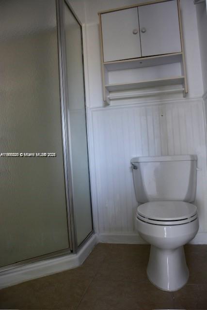 1610 Southwest 87th Court, Unit 101 Miami, FL 33165 - Photo 3 of 7 a bathroom with a toilet and a sink