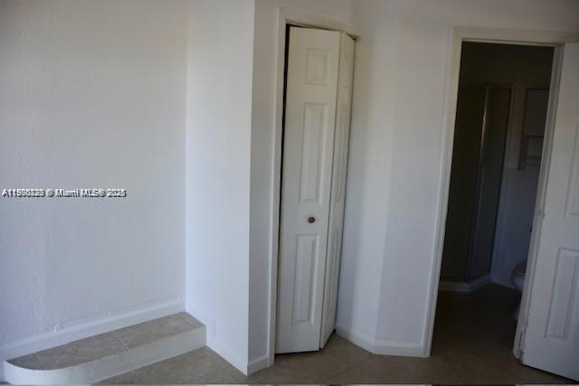 1610 Southwest 87th Court, Unit 101 Miami, FL 33165 - Photo 6 of 7 a view of a closet