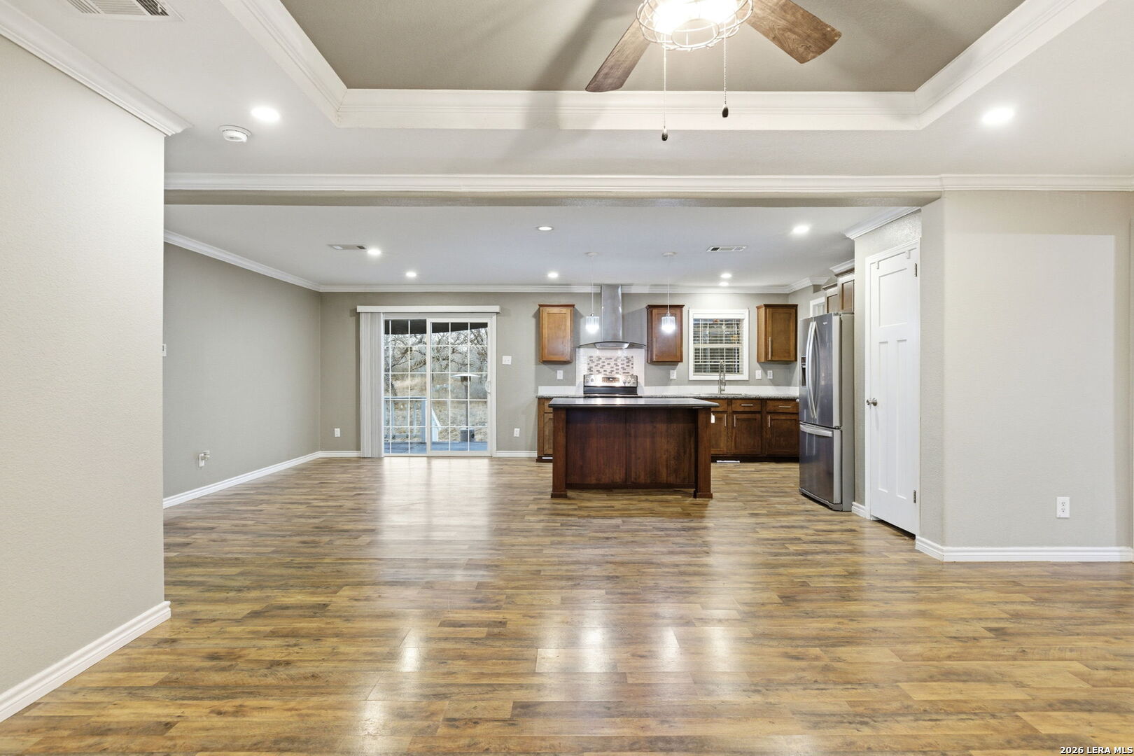2383 Tomblin Road Bigfoot, TX 78005 - Photo 12 of 61 a view of kitchen with wooden floor