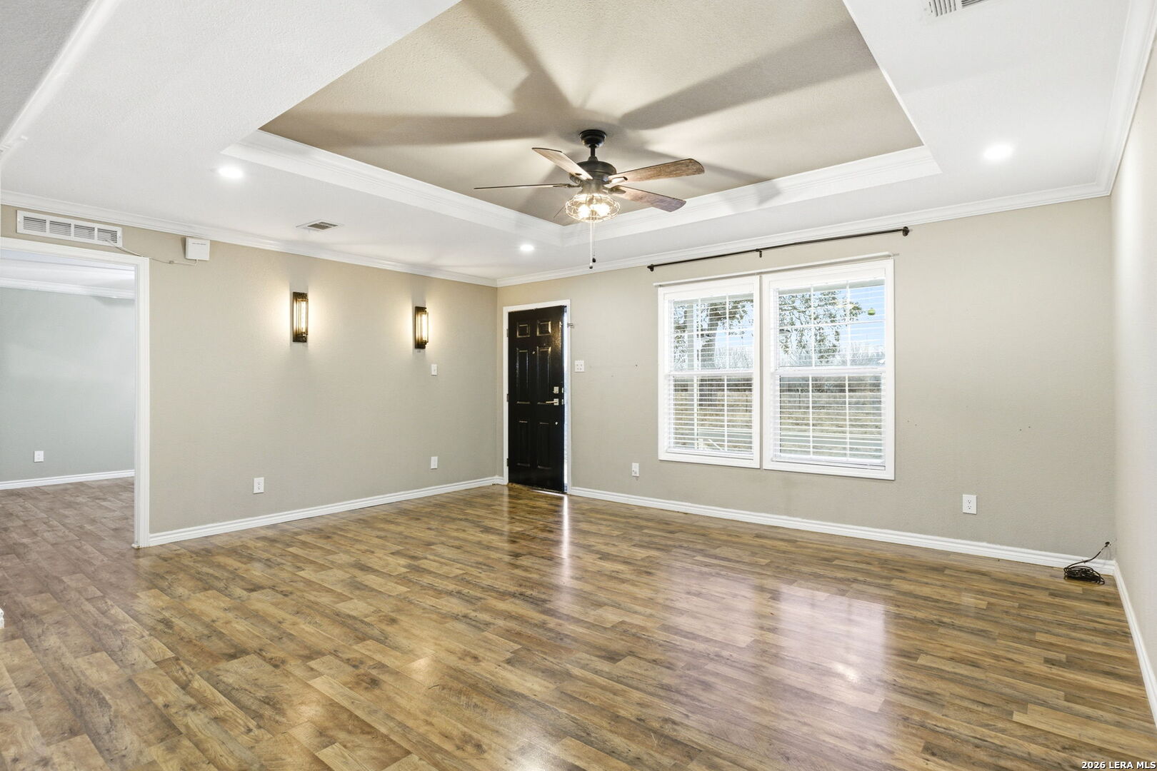 2383 Tomblin Road Bigfoot, TX 78005 - Photo 13 of 61 wooden floor in an empty room with a window