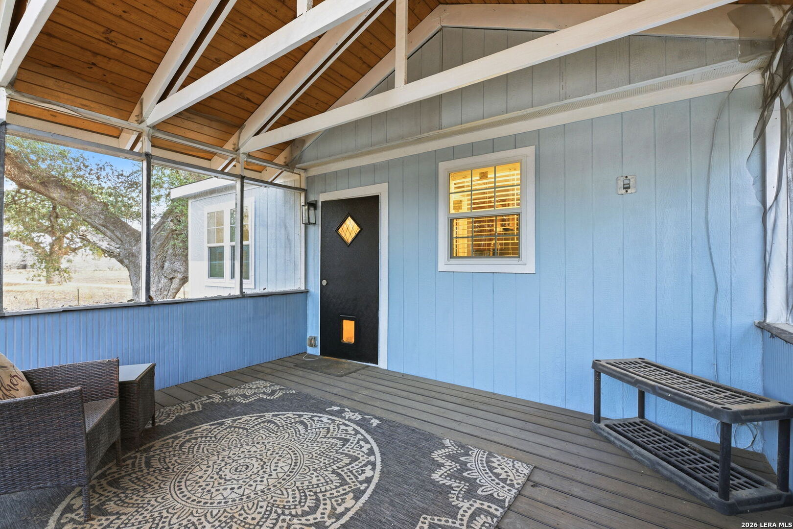 2383 Tomblin Road Bigfoot, TX 78005 - Photo 27 of 61 a view of a room with wooden floor and windows
