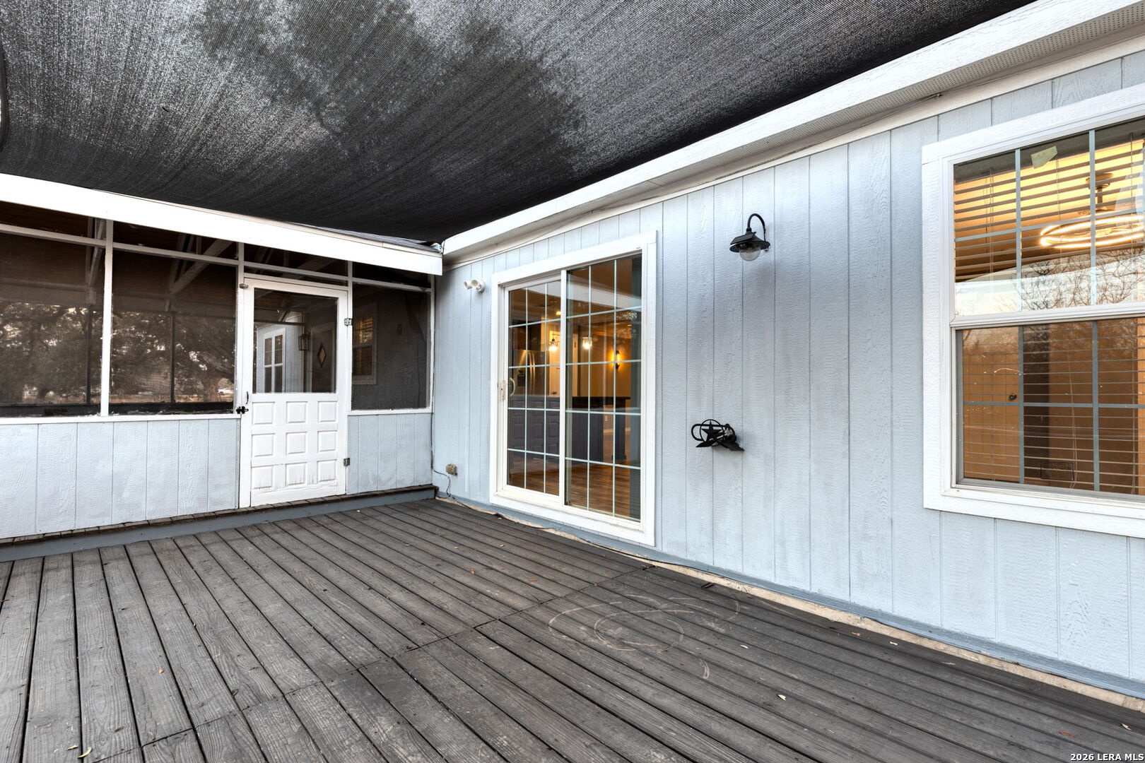 2383 Tomblin Road Bigfoot, TX 78005 - Photo 29 of 61 a view of porch with black and white walls